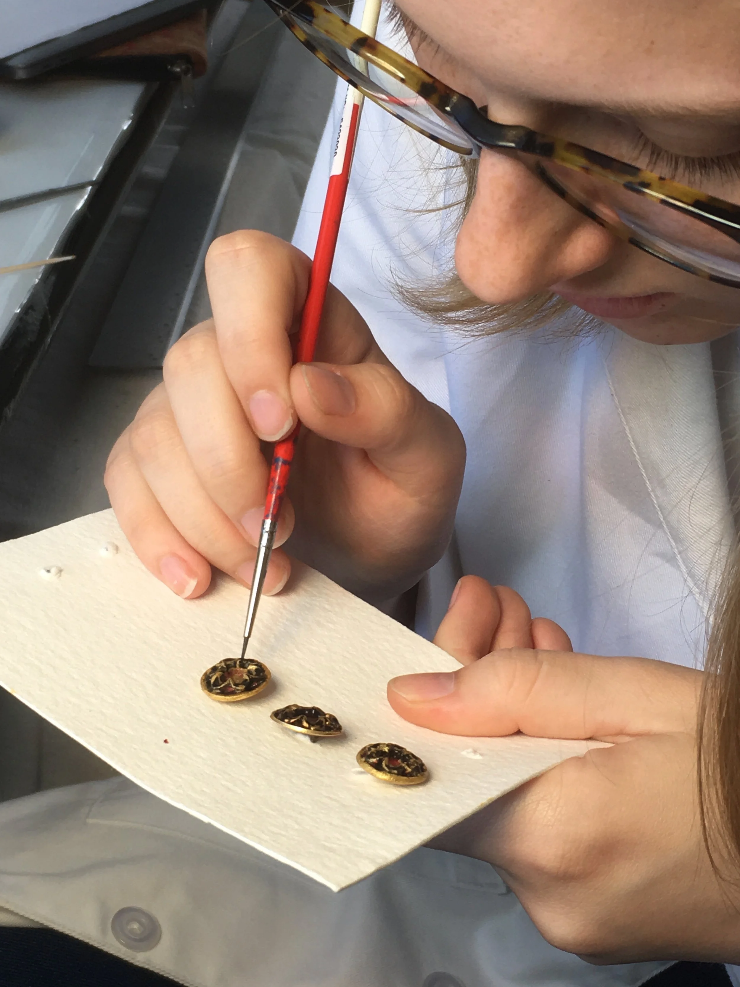 Doing last minute touch ups.