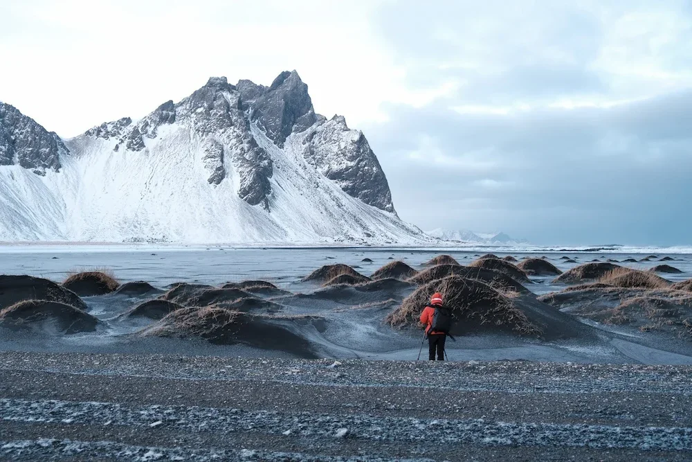 Vestrahorn mountain reflected on the black sand beach at Stokksnes Iceland