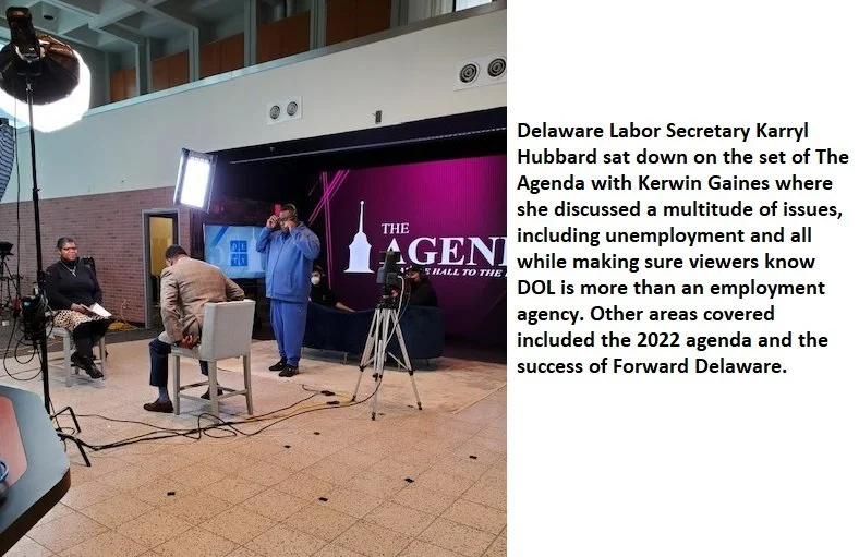 Delaware Labor Secretary Karryl Hubbard sitting on the set of The Agenda with Kerwin Gaines, discussing issues like unemployment, the 2022 agenda, and Forward Delaware, with cameras and lighting equipment nearby.