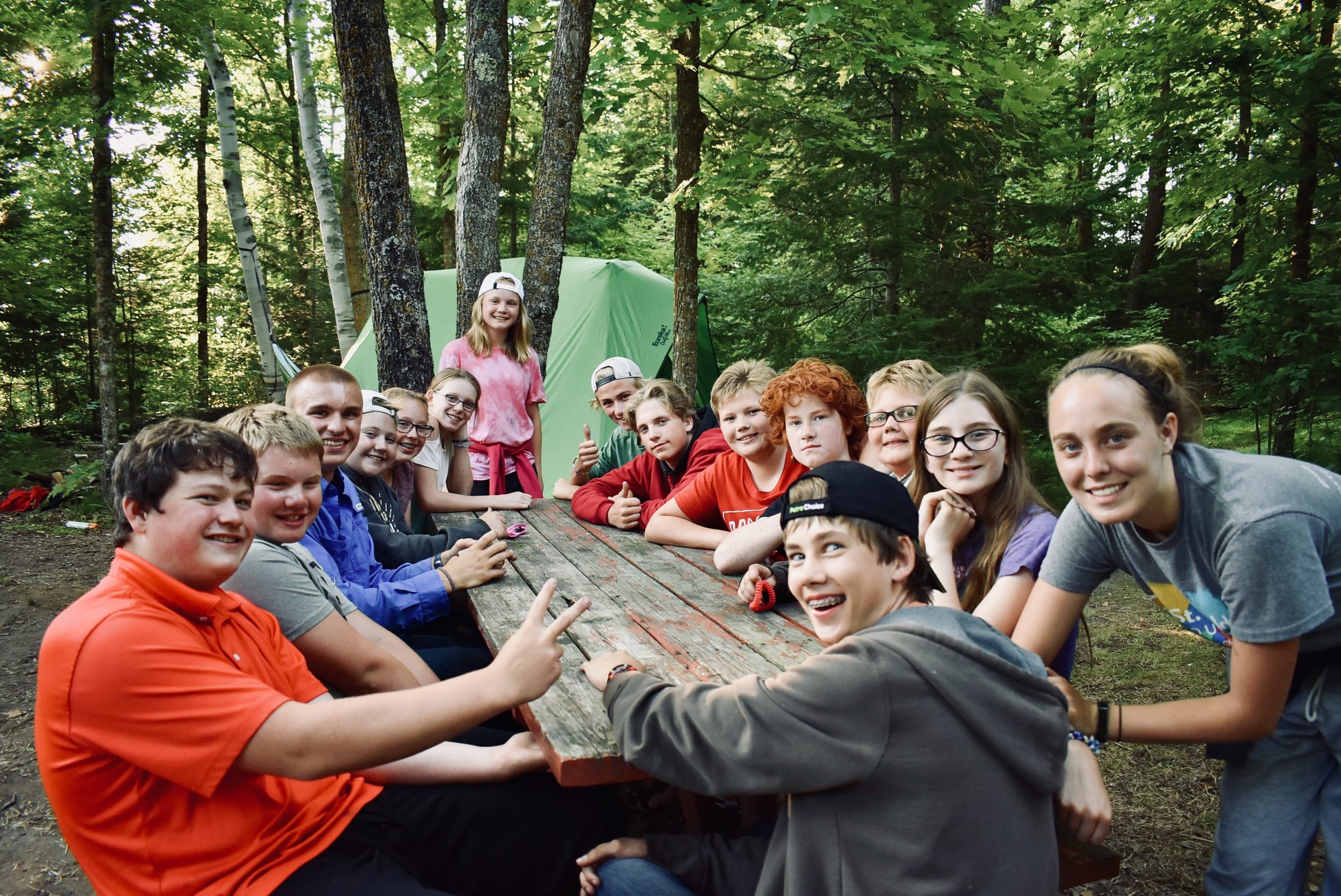 GROUP_group-of-older-kids-around-picnic-table-in-woods-EDITED.jpeg
