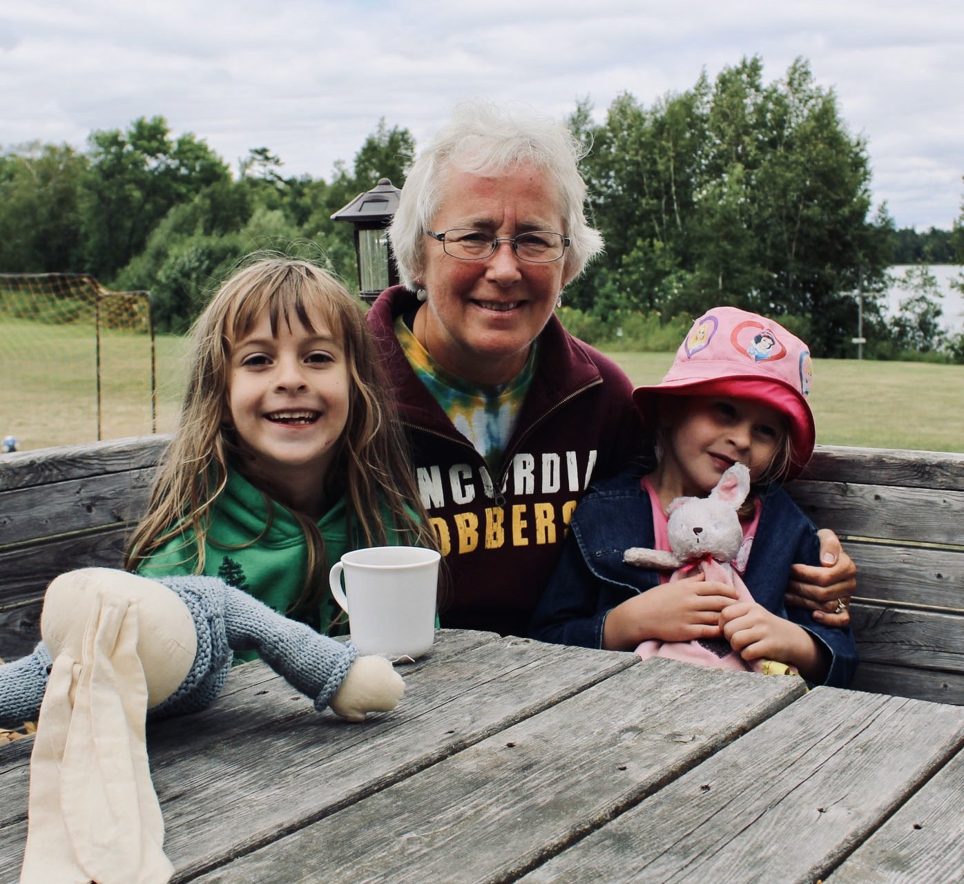 FAMILY-CAMP_older-adult-with-two-chidren-at-table-EDITED.jpeg