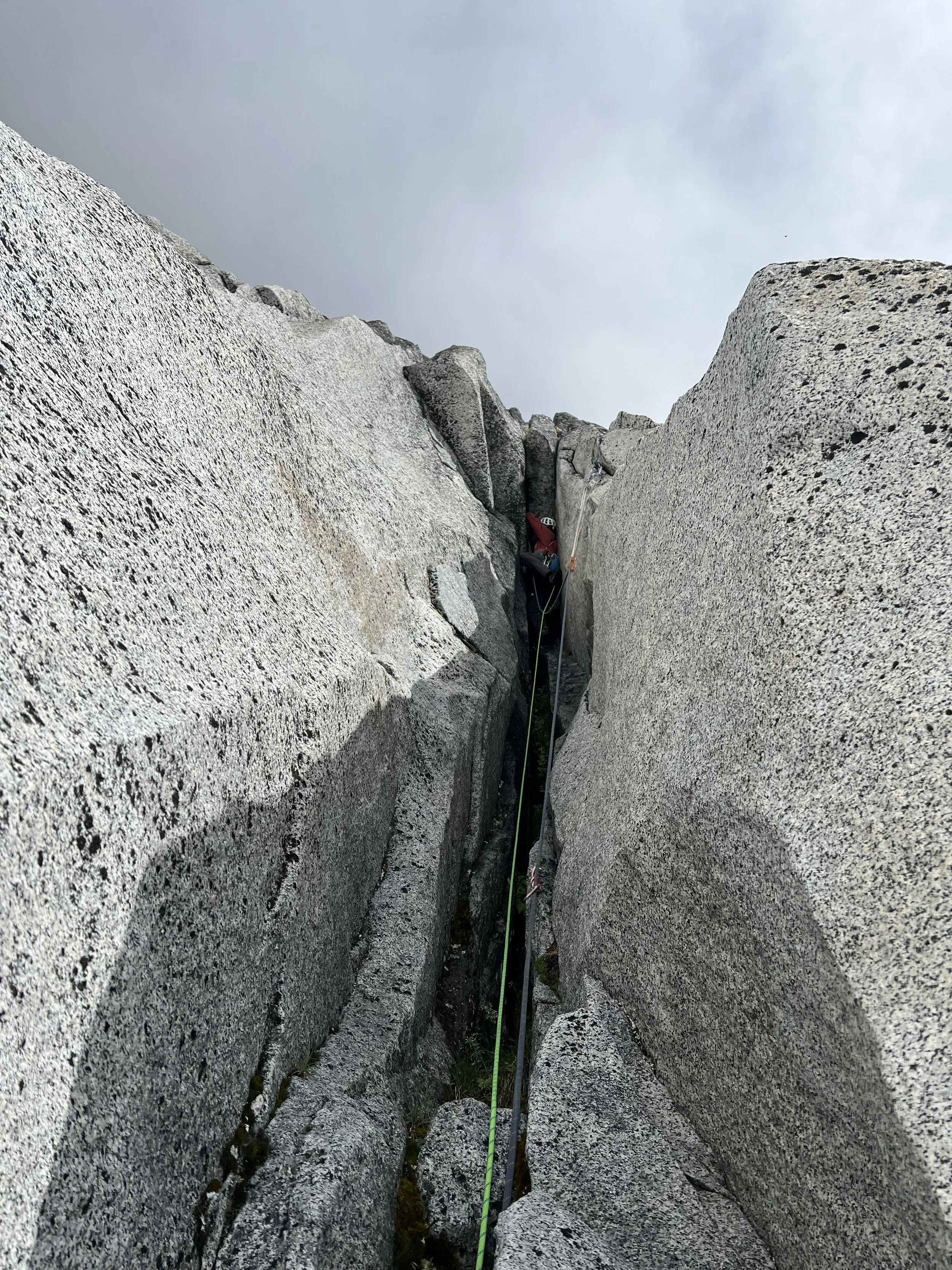 Danny on the first ascent of Hail Mary in the Pantheon Range during the first ascent of Skoll Peak NE3