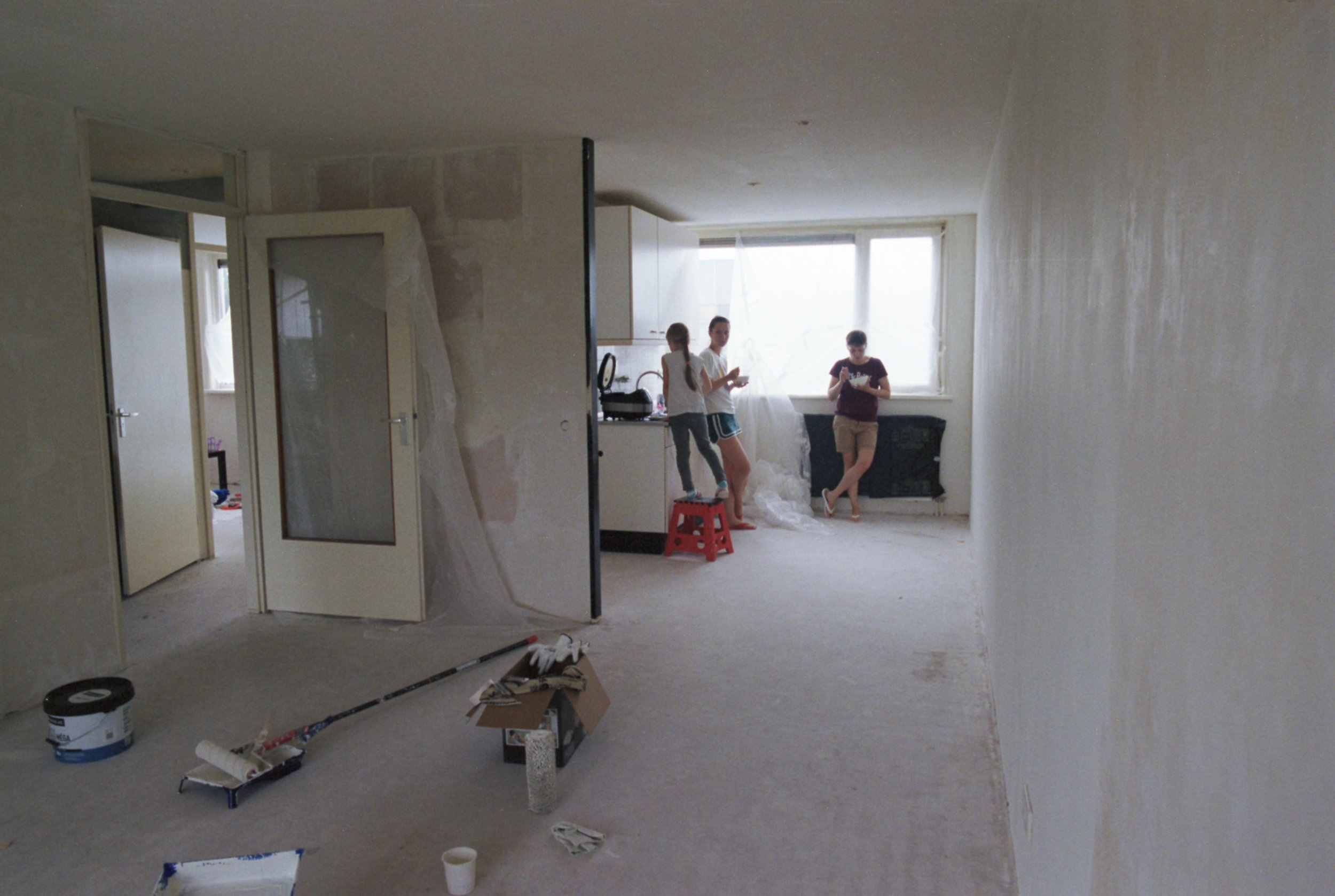 Girls in their new home, lunch break during one more day of renovation work.
After 2 years of waiting, they were given documents and were allowed to stay in the country. Enthusiastically painting walls, choosing furniture (they found a lot of good