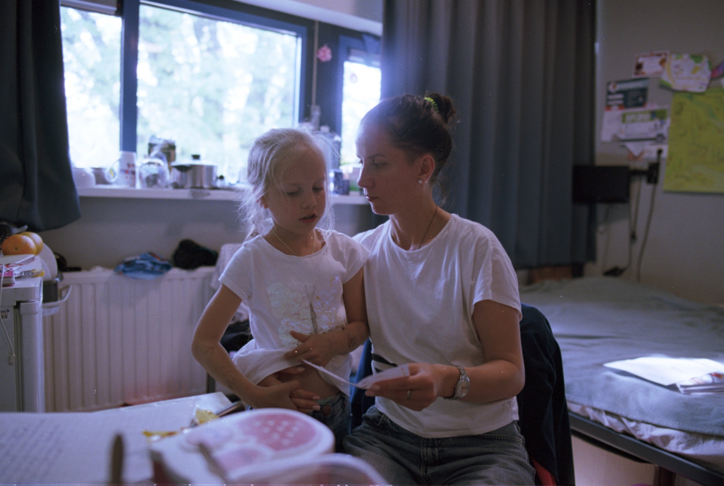Nataly and Sofia discussing Sofia's homework and preparing for a lunch.
One small room, no more than 18 square meters. For 3 people for 2 years. During COVID lockdowns they only left it to go the toilet, shower or for the trip to the supermarket o