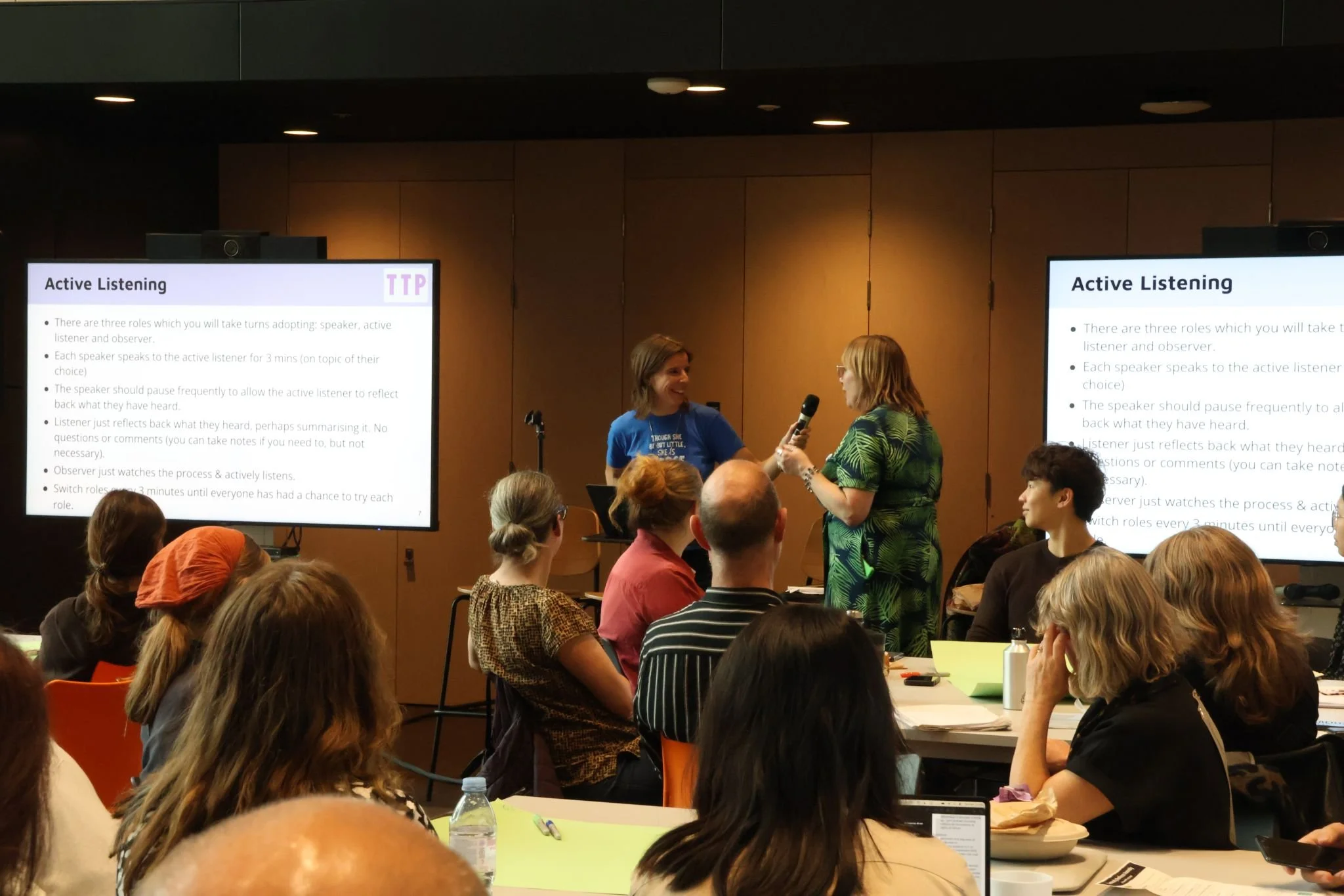 Art of regeneration members at a meeting