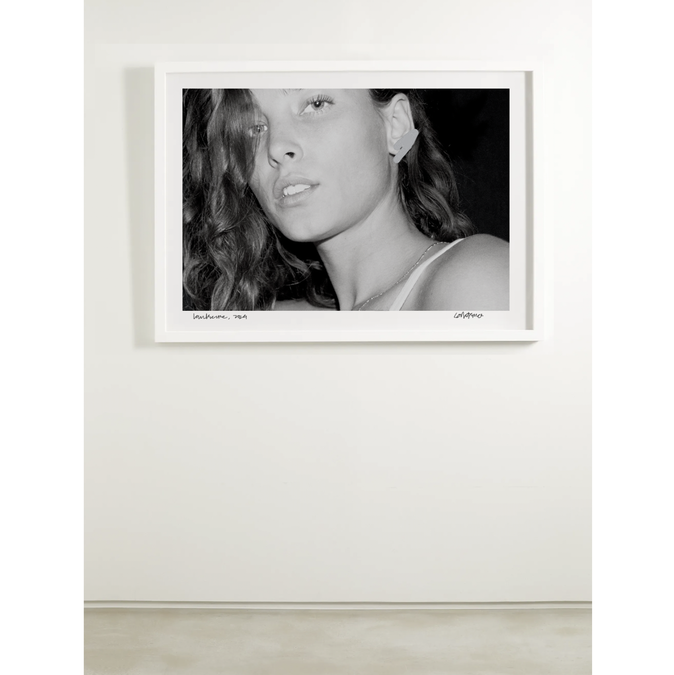 THE EARRING BW WHITE FRAME.png