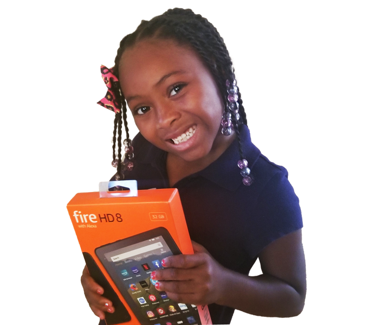 Smiling child holding an Amazon fire tablet