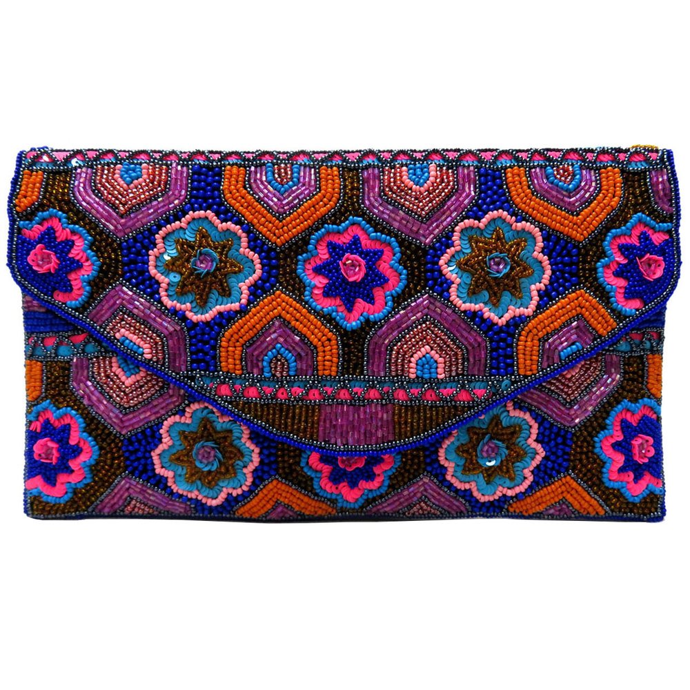 It’s a little bit Missoni, it’s big enough to put your phone in, it’s just the ticket for all the parties we are god damned owed.  Want.   Pink flower beaded clutch £50 