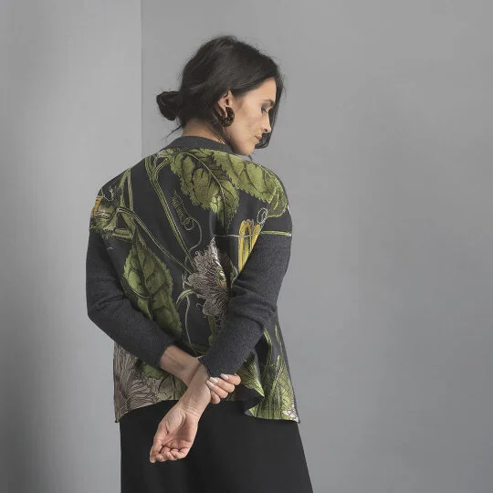 If you like your florals BIG then Kew is the place for you. This cardi is all Zoom calls on the front, kitchen supper party on the back.   Passionflower Cashmere Cardigan £175 