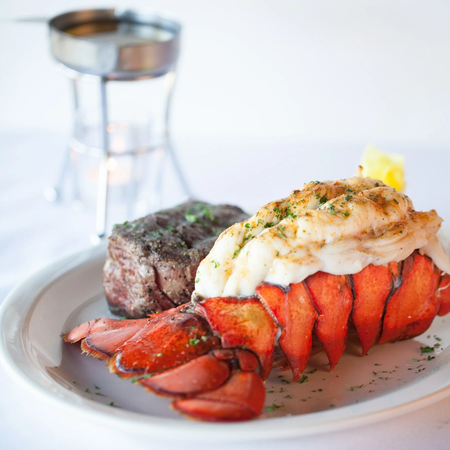 Upgrade your dinner with the ultimate pairing: a buttery lobster tail alongside your favorite prime steak. A little indulgence never looked (or tasted) so good.