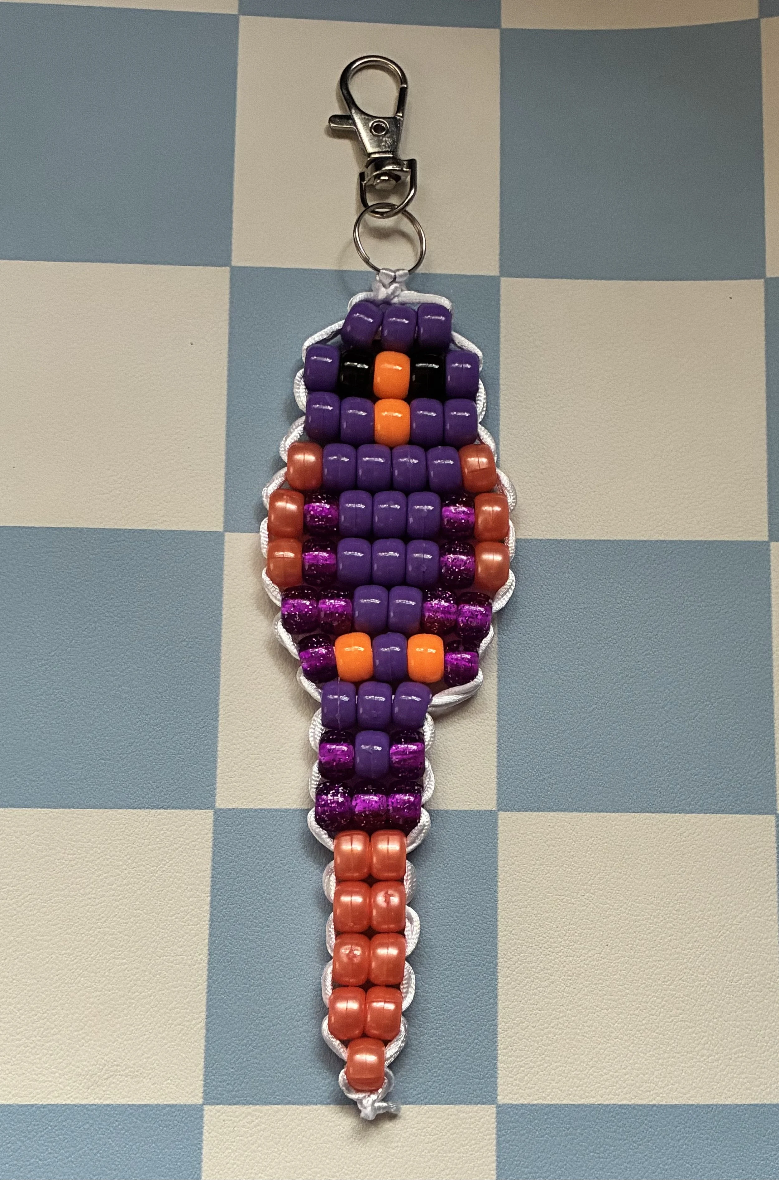 PercyTheParrot_Purple_Orange.jpeg