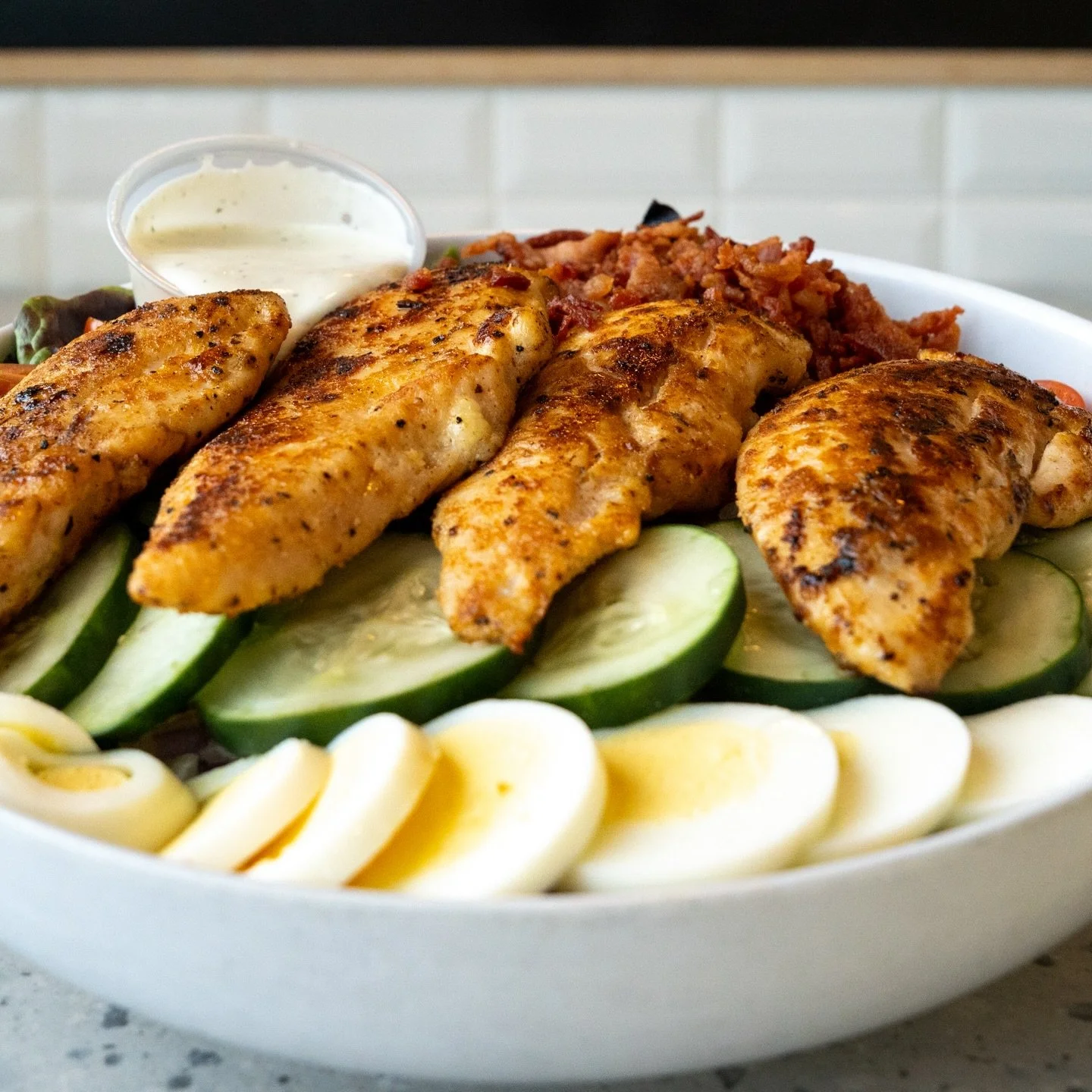 Lettuce kick off the weekend with some Tender Love (feat. Grilled Tenders) 🥗🤭 The Tender Love salad is packed with, greens, cheddar cheese, red onion, tomato, cucumber, bacon, hard-boiled egg, and of course, tenders 🤤 See you at Sammies?