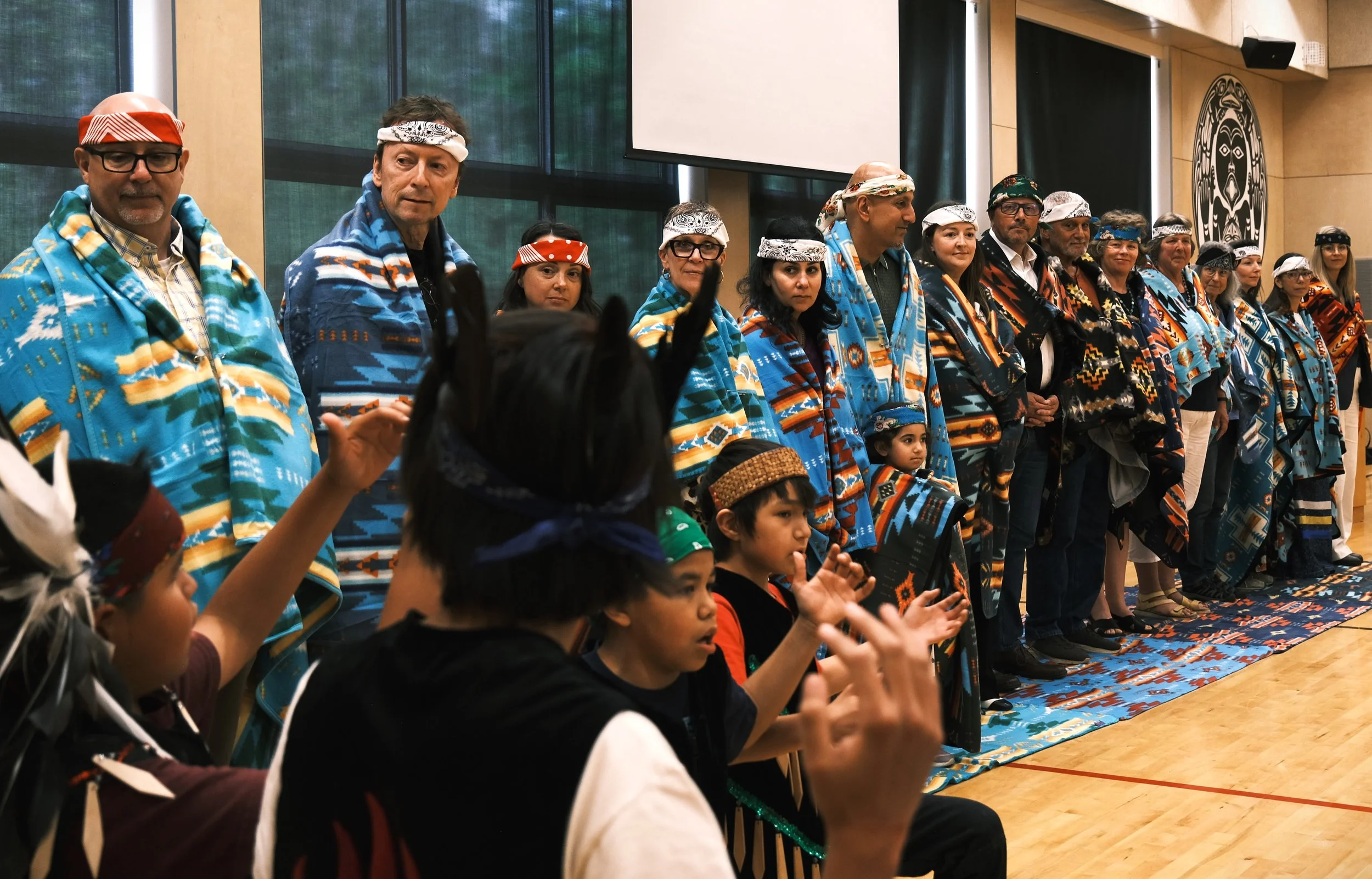 Kids Raising Hands to Donors.JPG