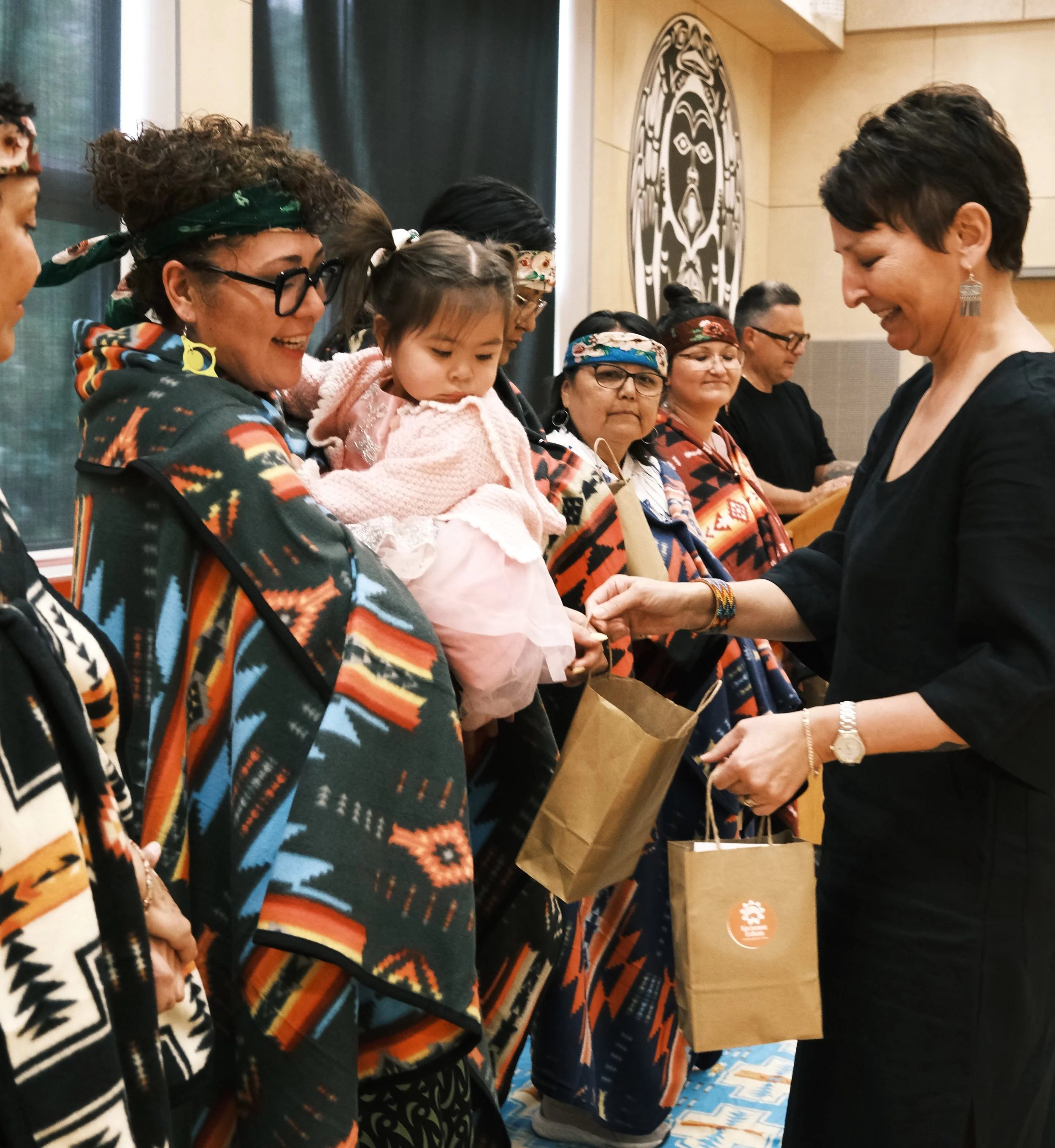 Sharon gifting grads.JPG