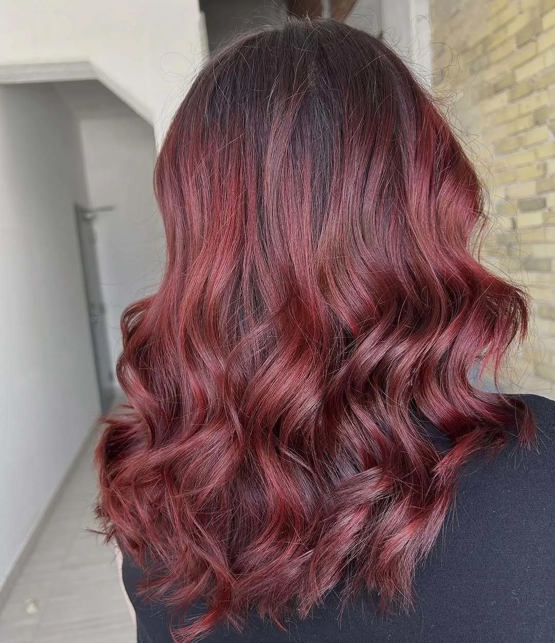 @createdby.becca A red so vibrant it deserves its own spotlight 🔥✨ this isn&rsquo;t just red, it&rsquo;s HER red ❤️ 
&bull;
&bull;
&bull;
#yqghairstylist #yqghair #yqgsmallbusiness #walkerville #windsorhairstylist #windsorhair #519hair #519hairstyli