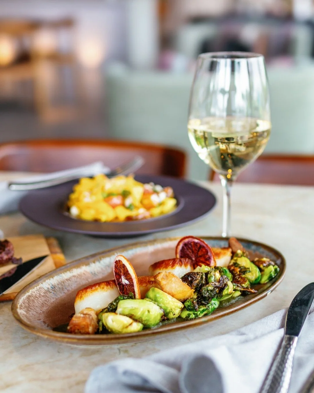 Pulling up a chair for this one. 🍷⁠
⁠
Spent the afternoon photographing the menu at Weft &amp; Warp, and let me just say... the food photographs as good as it tastes. 🤌⁠
⁠
If you haven't been, it's the Mediterranean spot tucked inside the Andaz in 