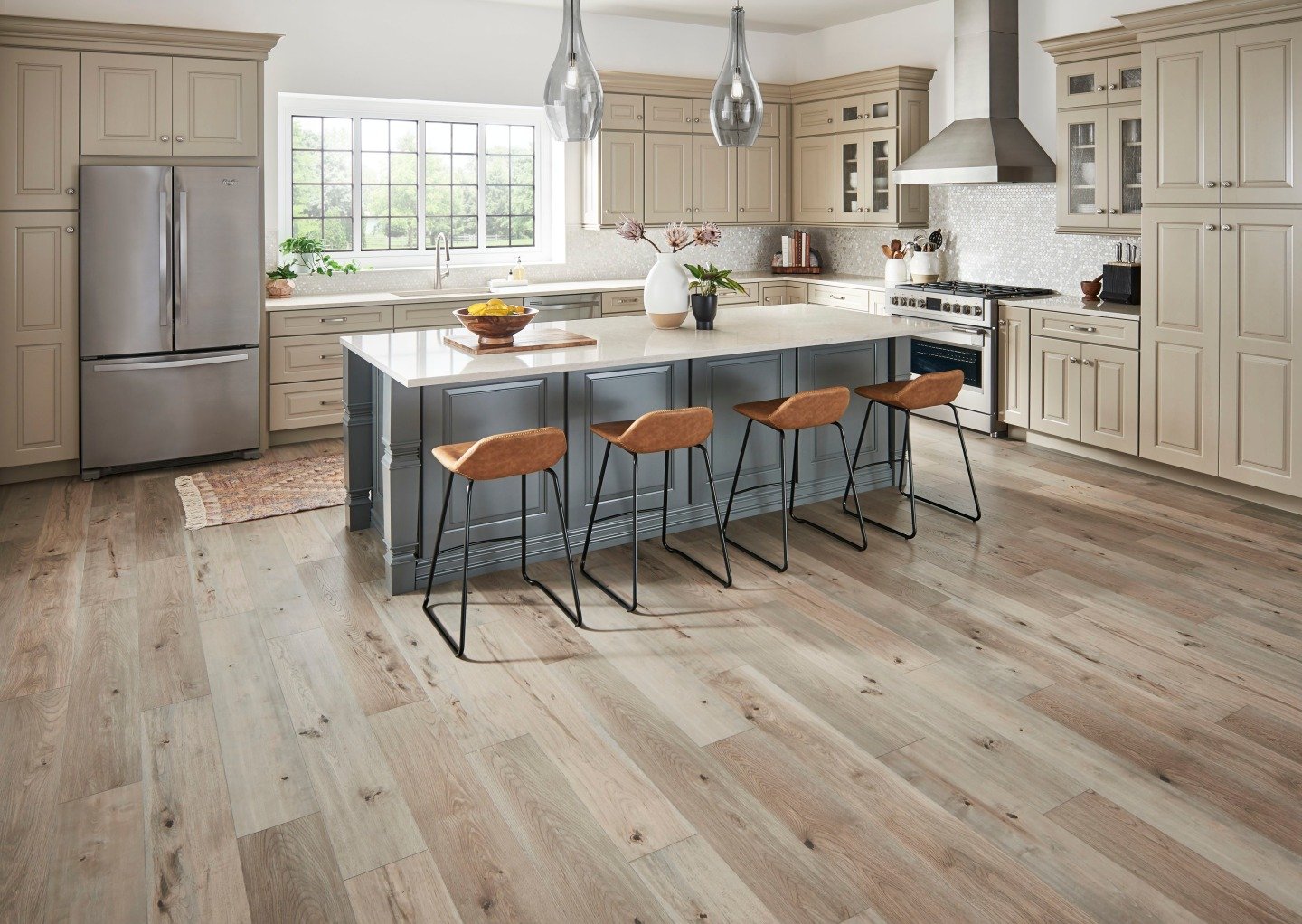 Ready for a refresh? Give yourself the perfect foundation with @manningtonfloors Anthology Restoration&reg; Collection Laminate! Award-winning printing technologies bring this rich, unique blend of White Oak, Maple, and Hickory wood to life and groun