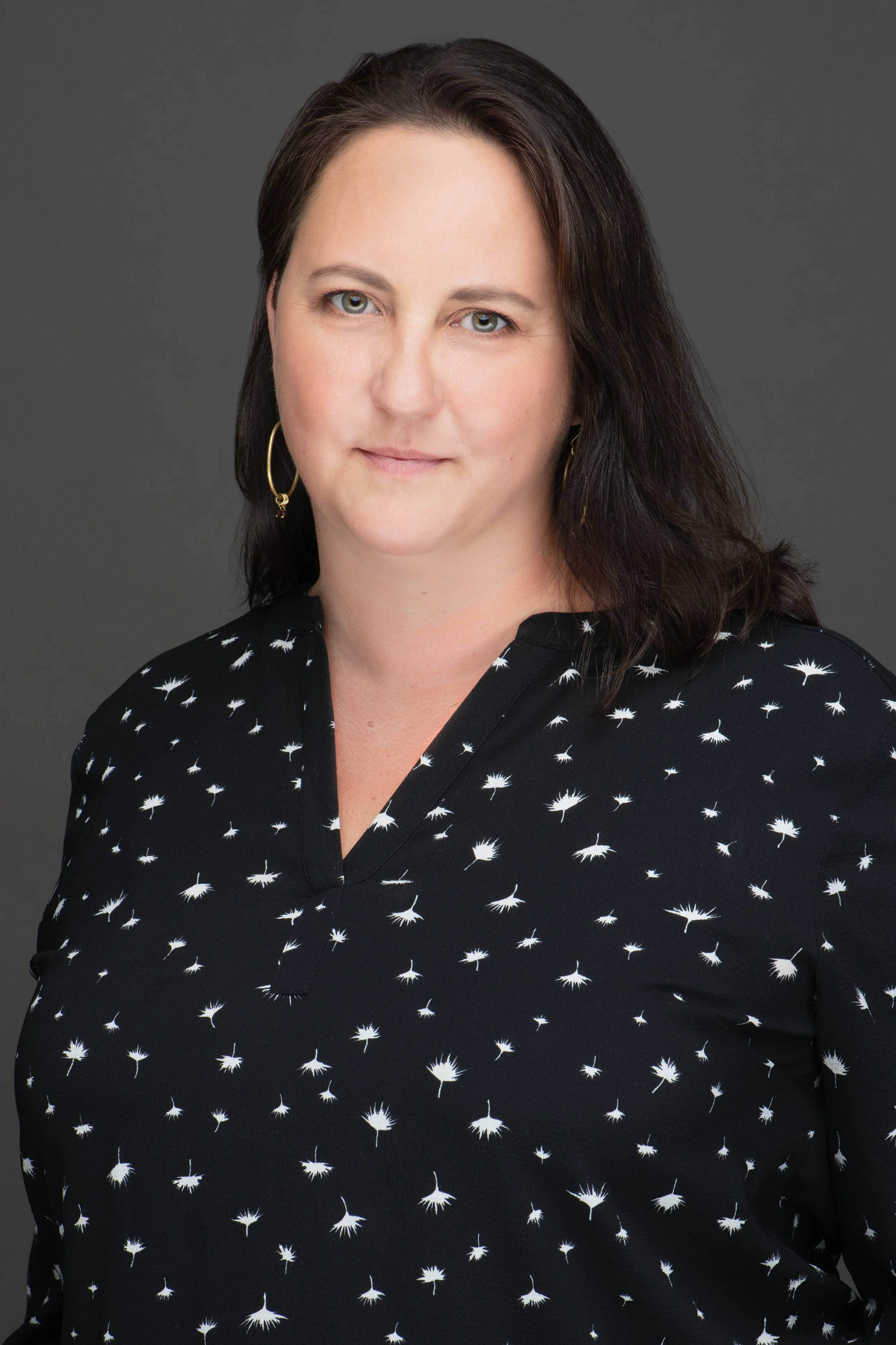 Our Team — Delaney & Company