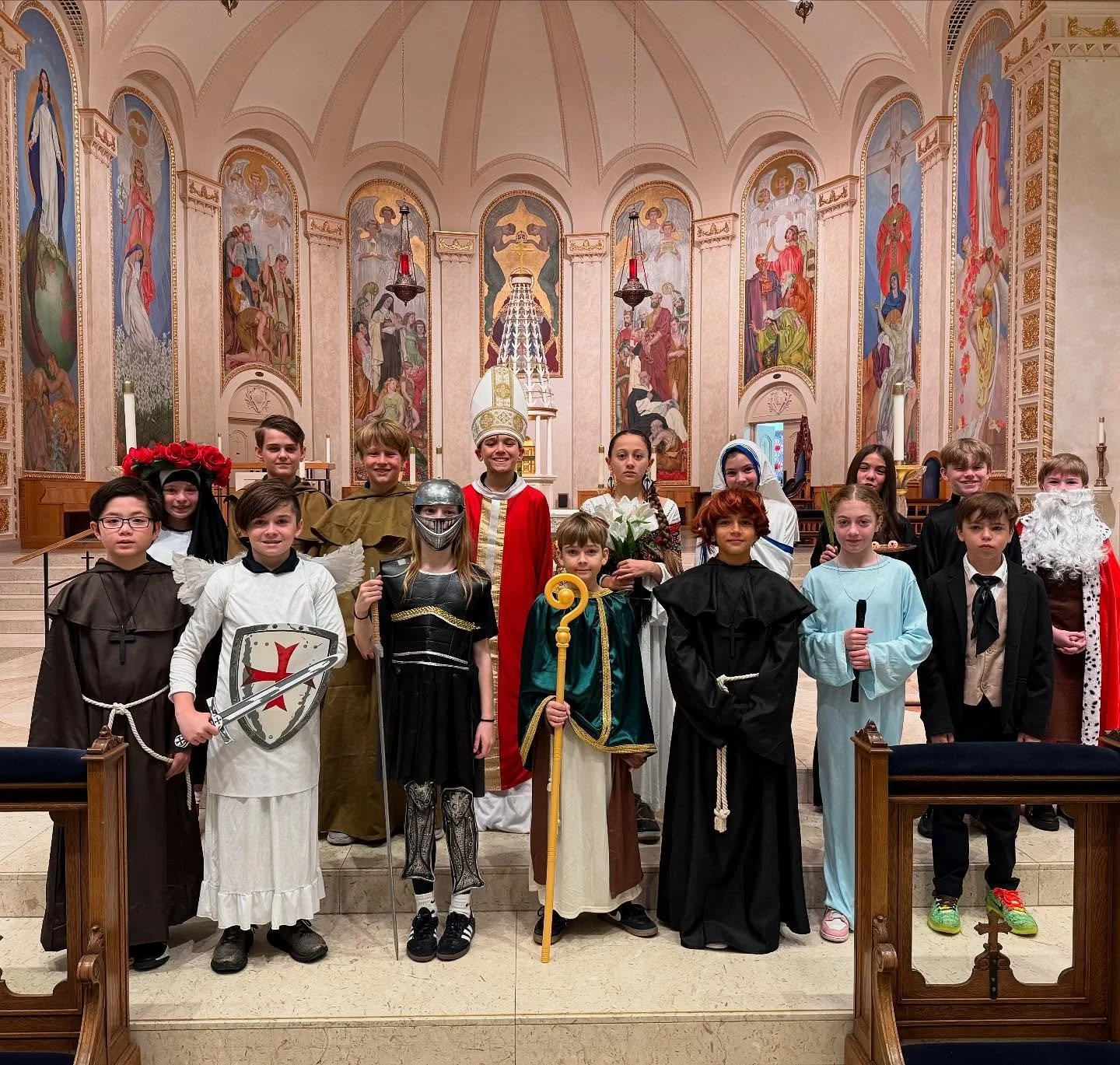 All Saints Day Mass and 5th grade Saints Museum

Fifth grade students chose a saint, did research on them, wrote a report, created a presentation board, and dressed up as their saint; giving live presentations to other students, staff, and family and