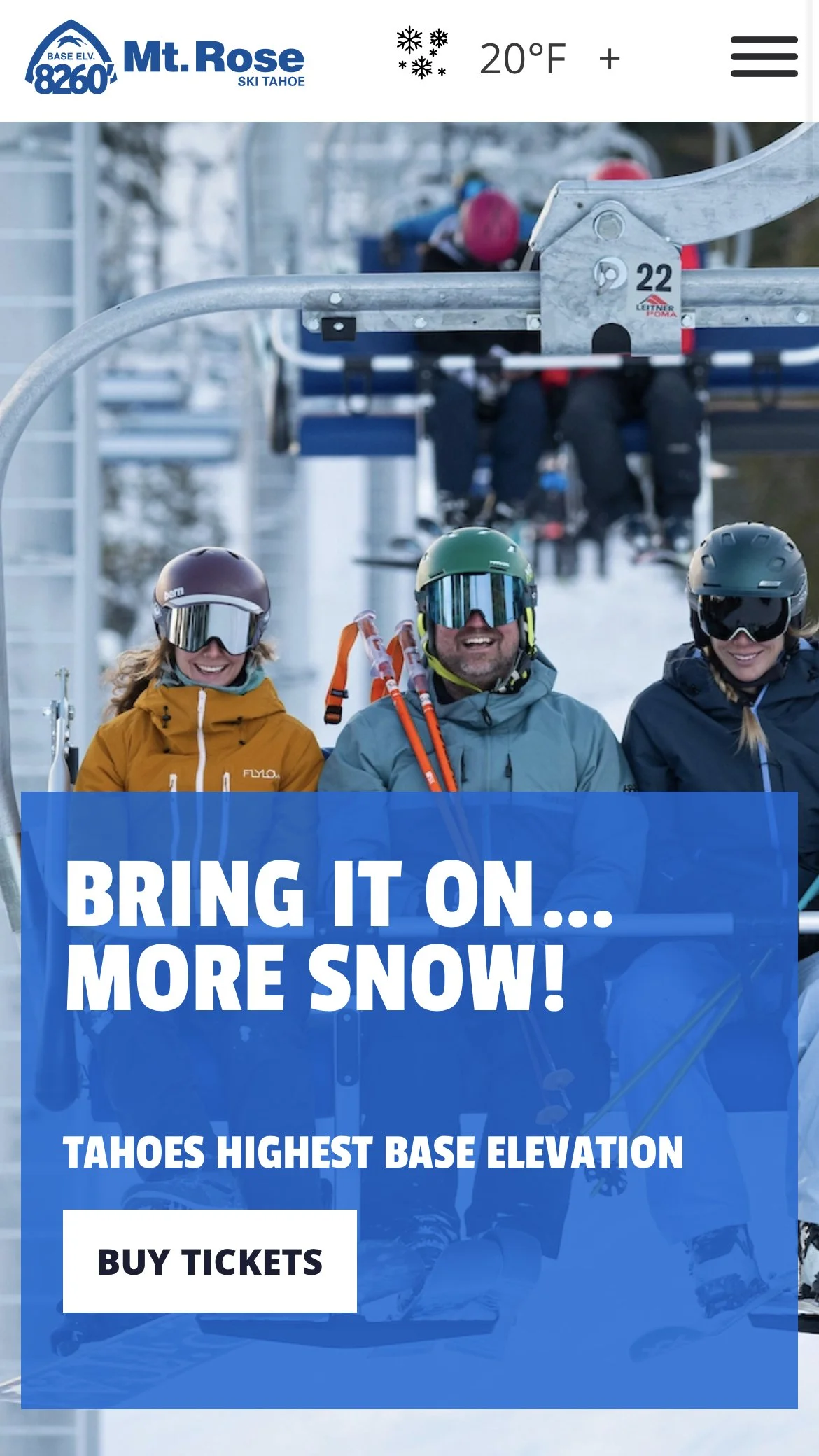 Group of smiling skiers in gear at a ski lift with snow, trees, and ski lift chairs in the background at Mt. Rose Ski Tahoe.