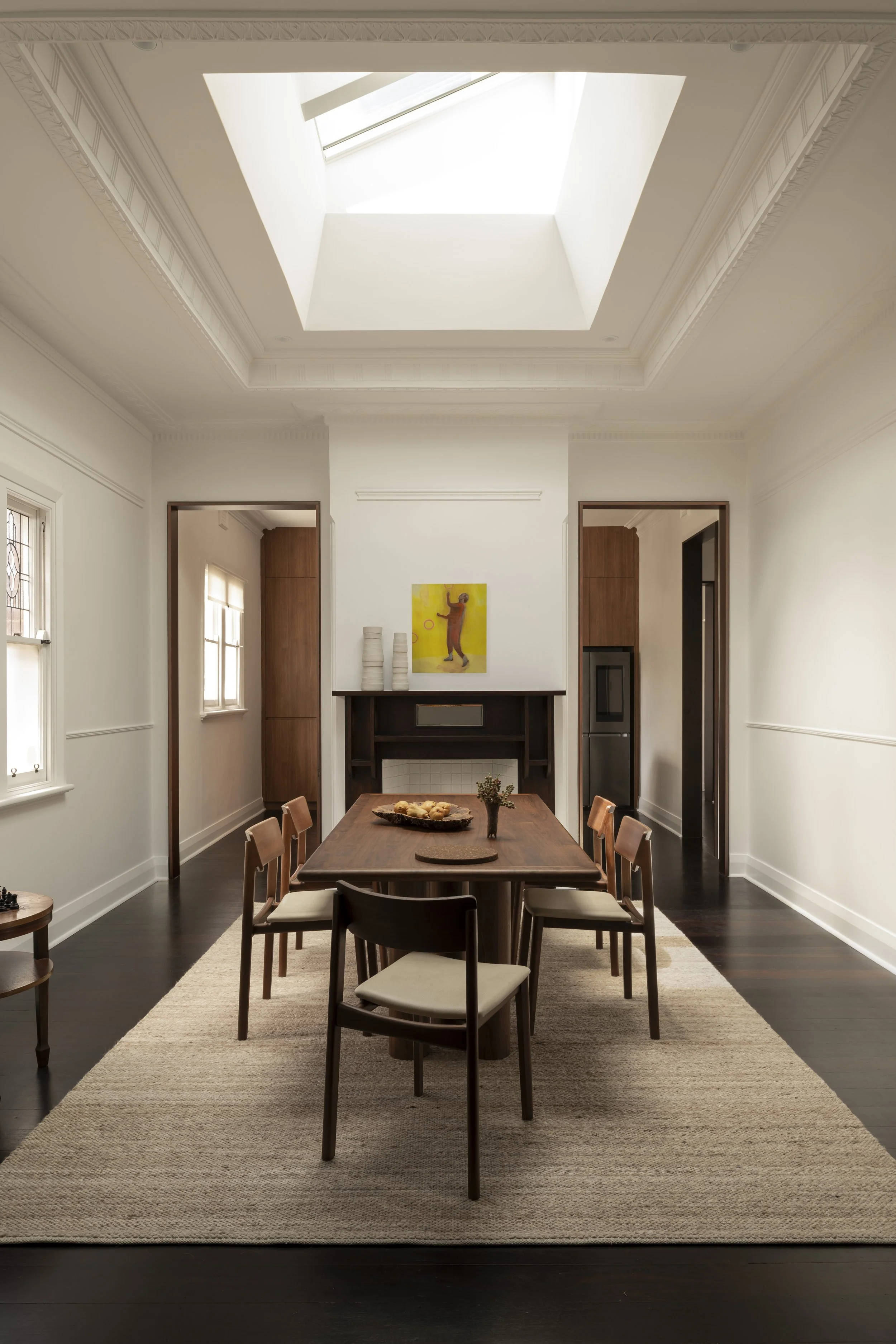 Oakover St – Light-filled dining room with central skylight, restored fireplace, and refined heritage detailing