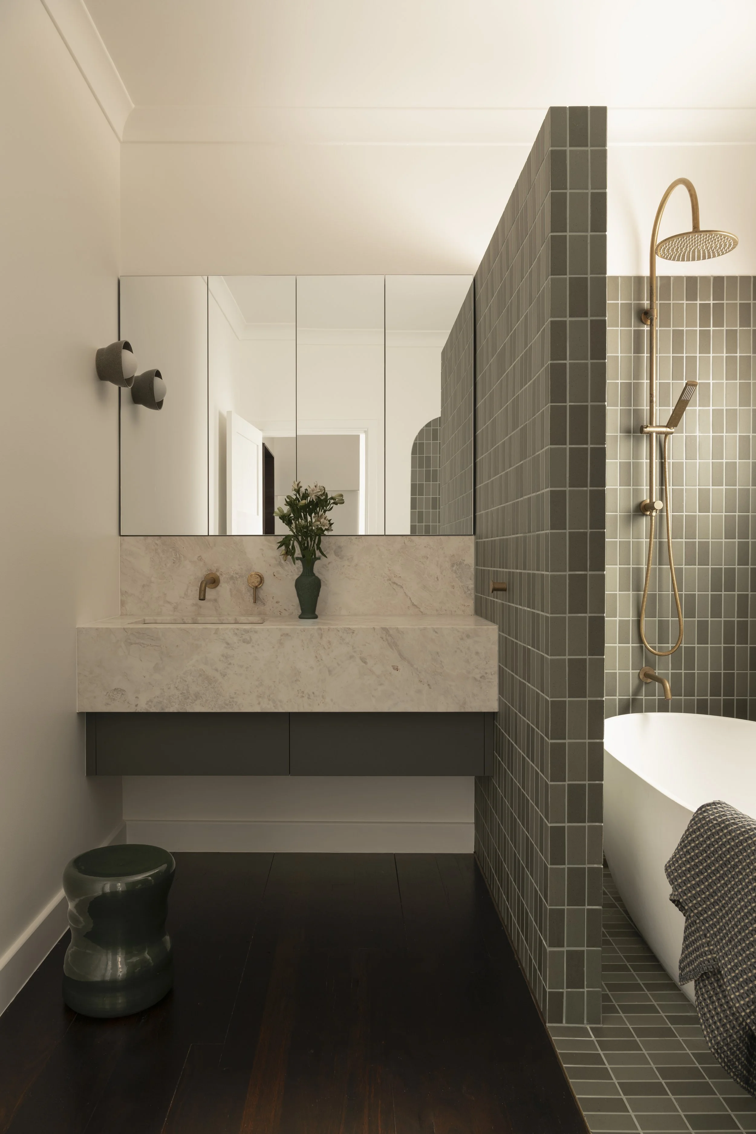 Oakover St – Family bathroom with custom stone vanity, green tiled shower screen, and brass fixtures