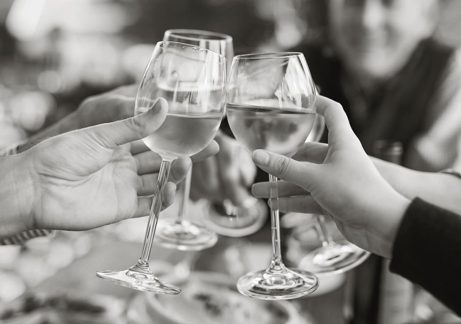 friends toasting in remembrance at a celebration of life