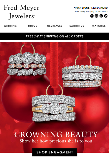 Jewelry advertisement featuring diamond rings and earrings with red Christmas ornaments in the background, promoting Fred Meyer Jewelers.