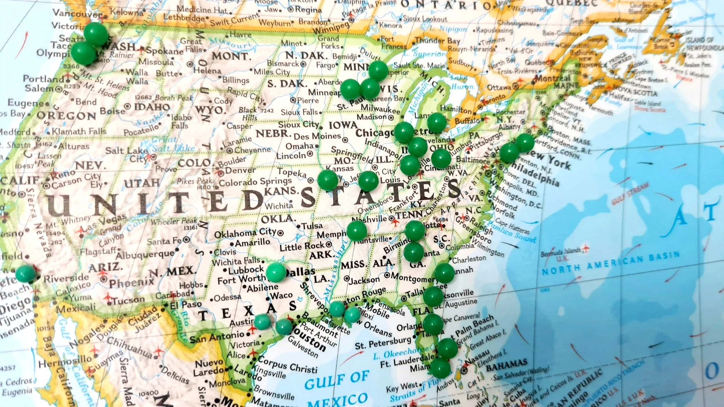 Map of the United States with multiple blue location pins across various states including the Midwest, Southeast, Northeast, and West Coast.
