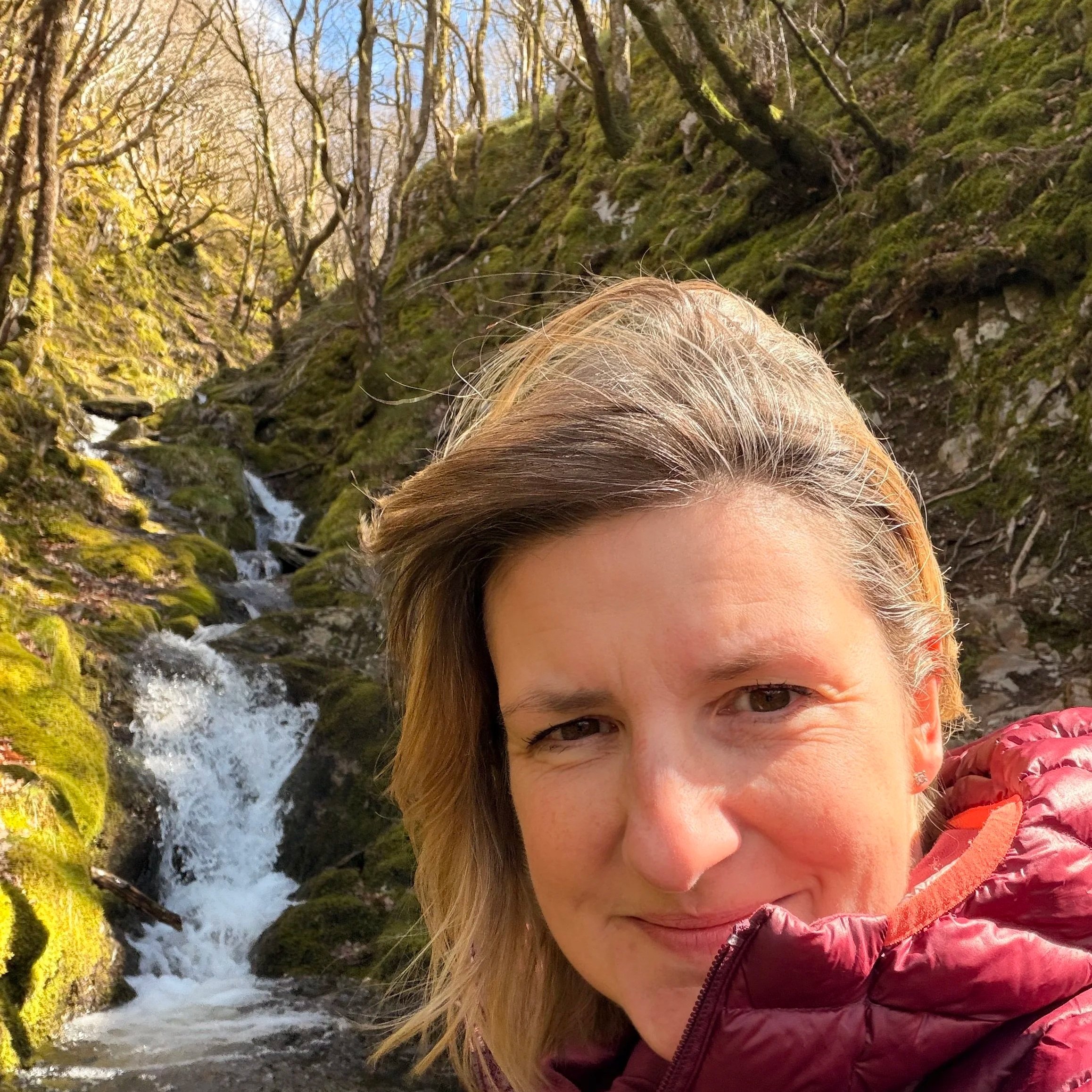 meditating at a waterfall