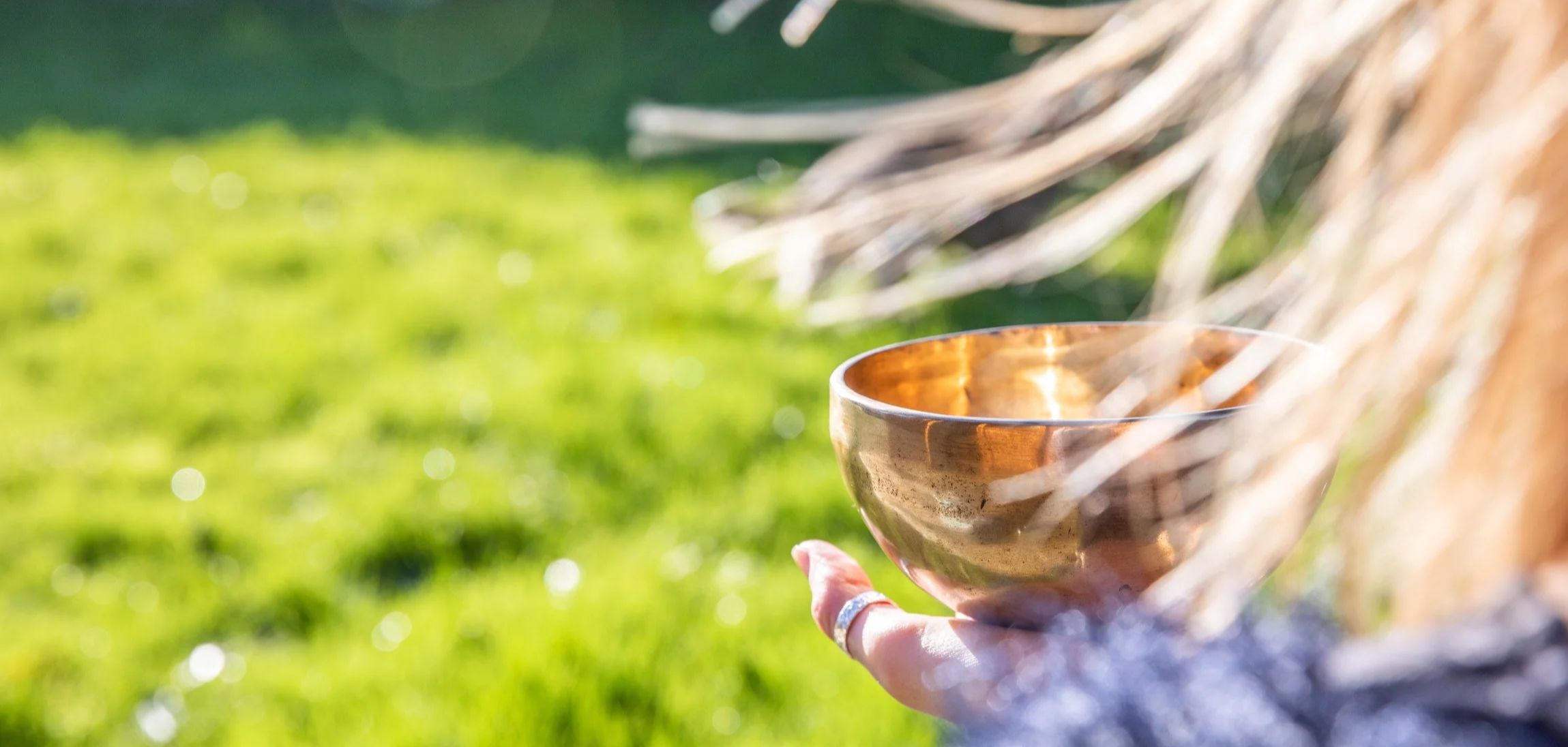 lady meditating with Tibetan singing bowl