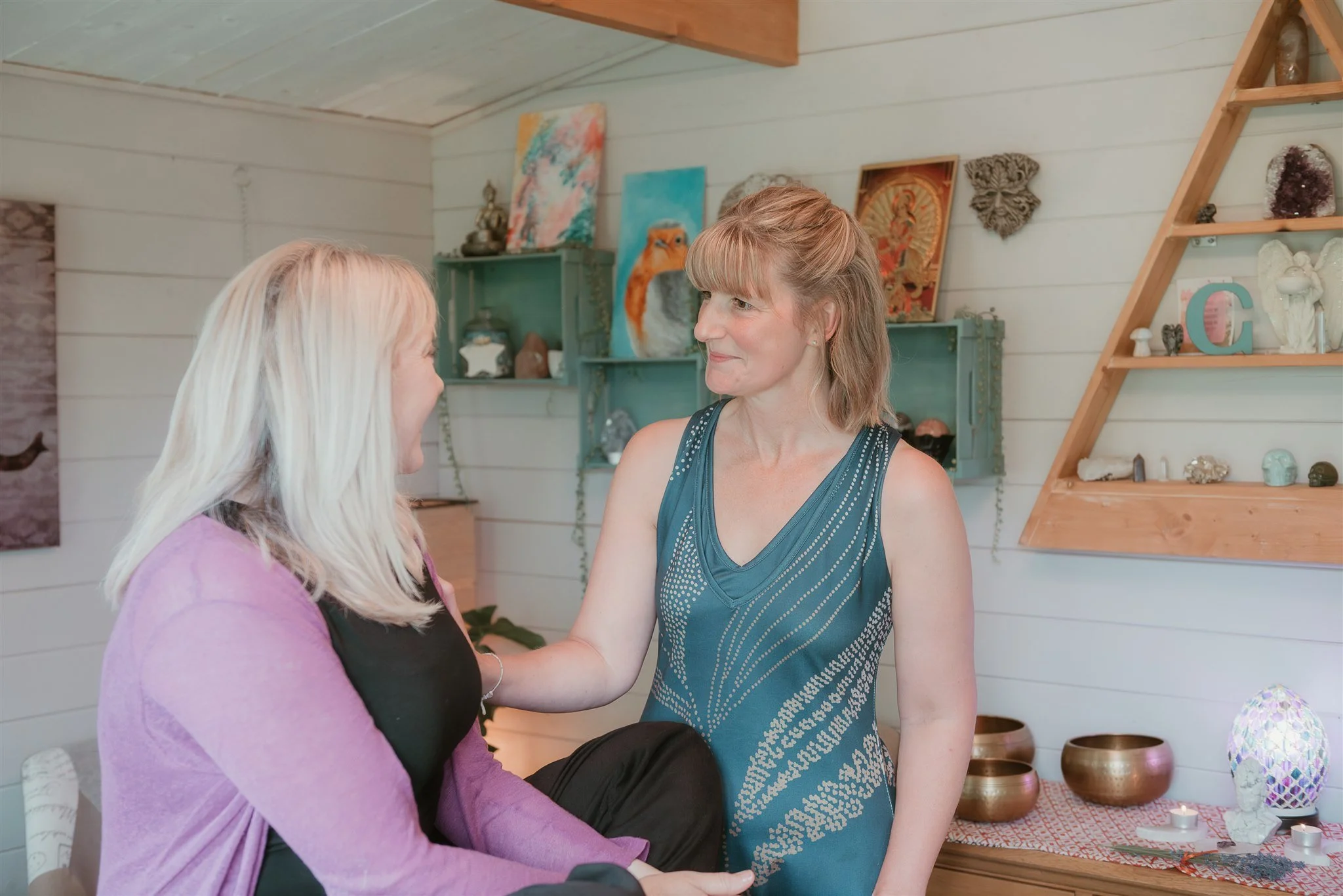 Clare Marie Holistic Therapist talking with a client