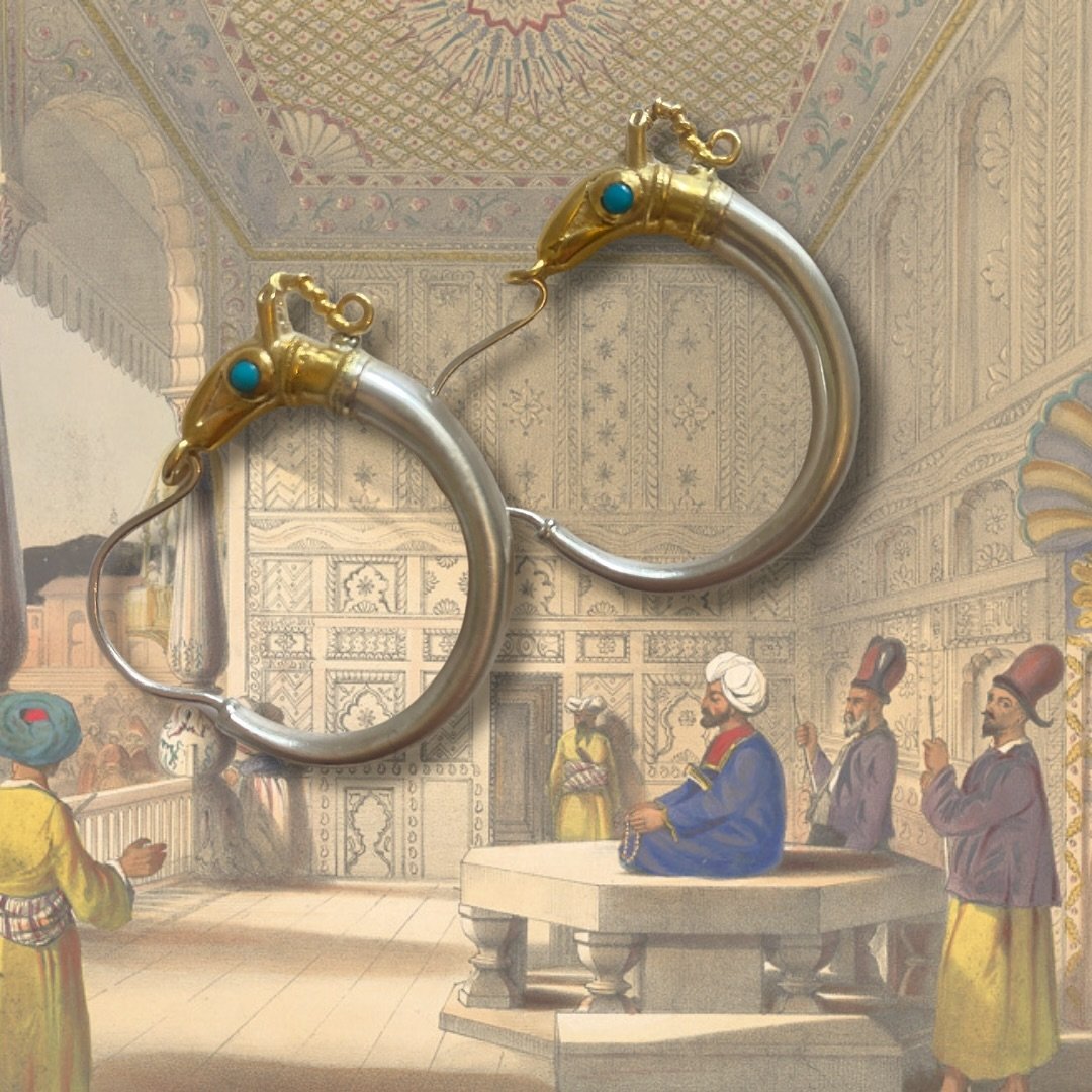 The Silk Road and its many wonders and treasures form the core of much of Sally&rsquo;s work. These beautiful gilded Ibex-headed hoops are inspired by an ancient Afghan design. The background image is an engraving depicting the opulent interior of th