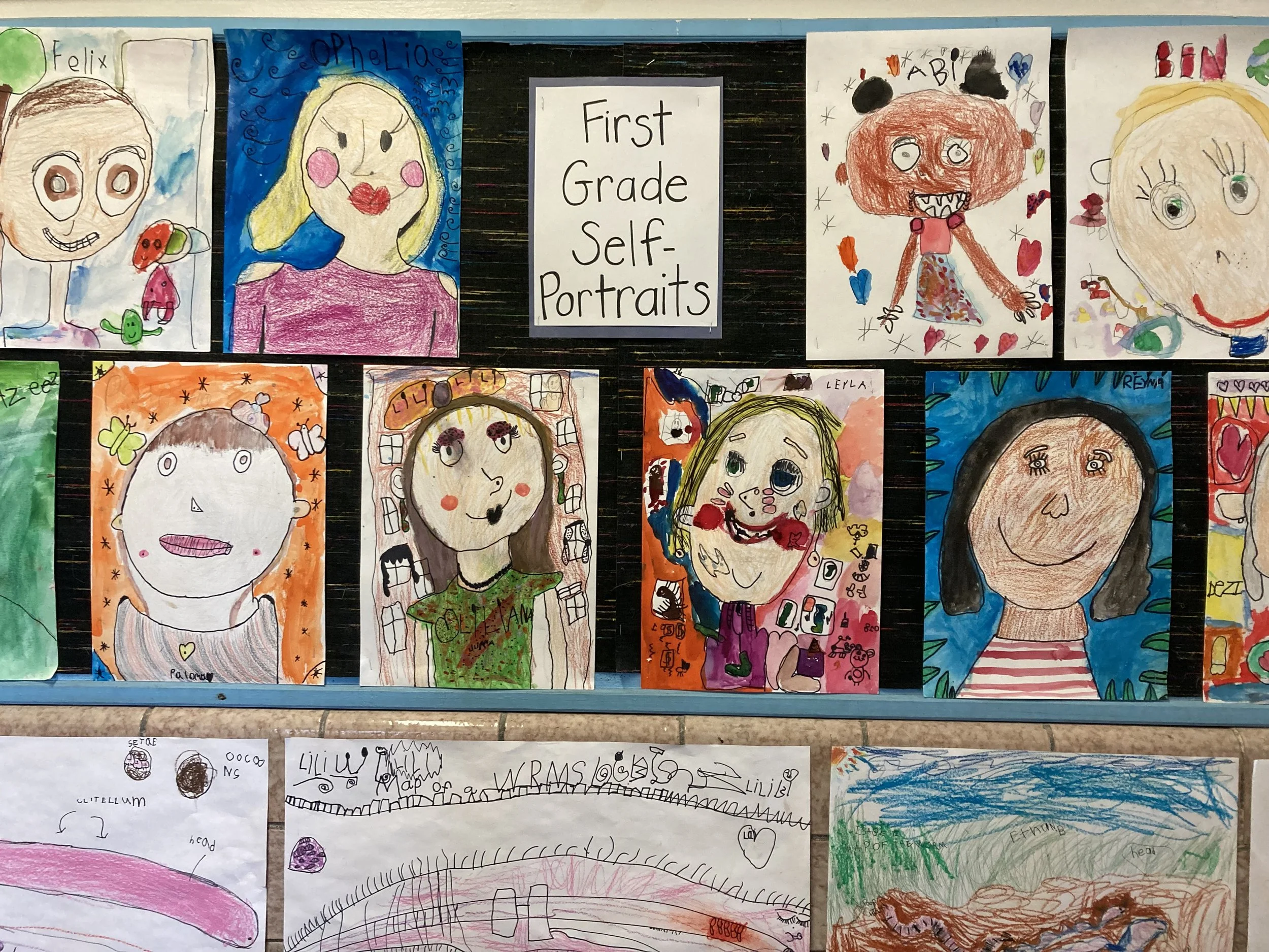 Collection of self-portraits by first graders.