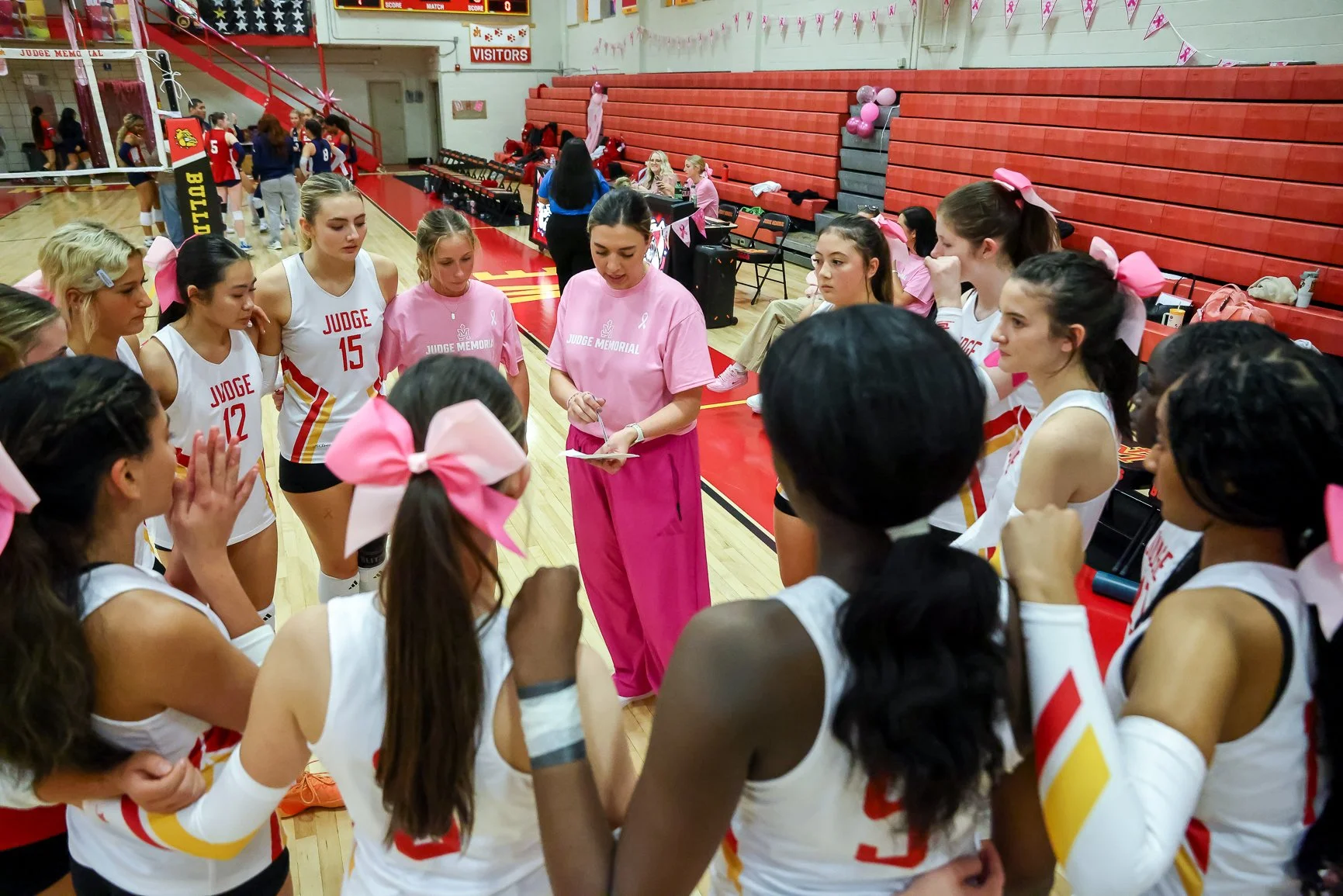 girls volleyball huddle.JPEG