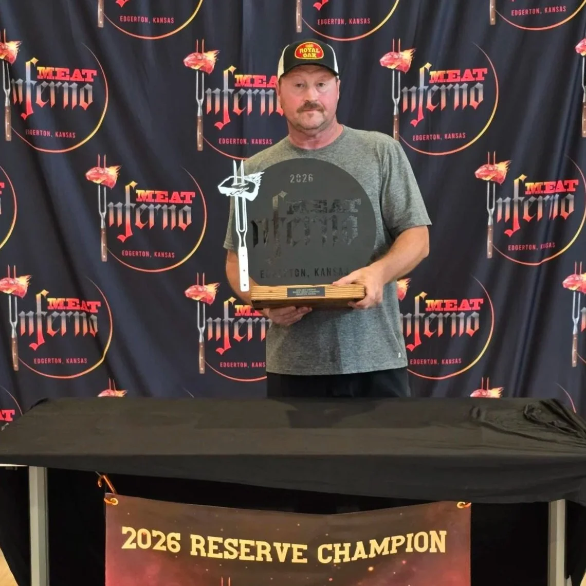 Reserve Champion - Parts R Smokin' - The man holds a black meat inferno trophy.