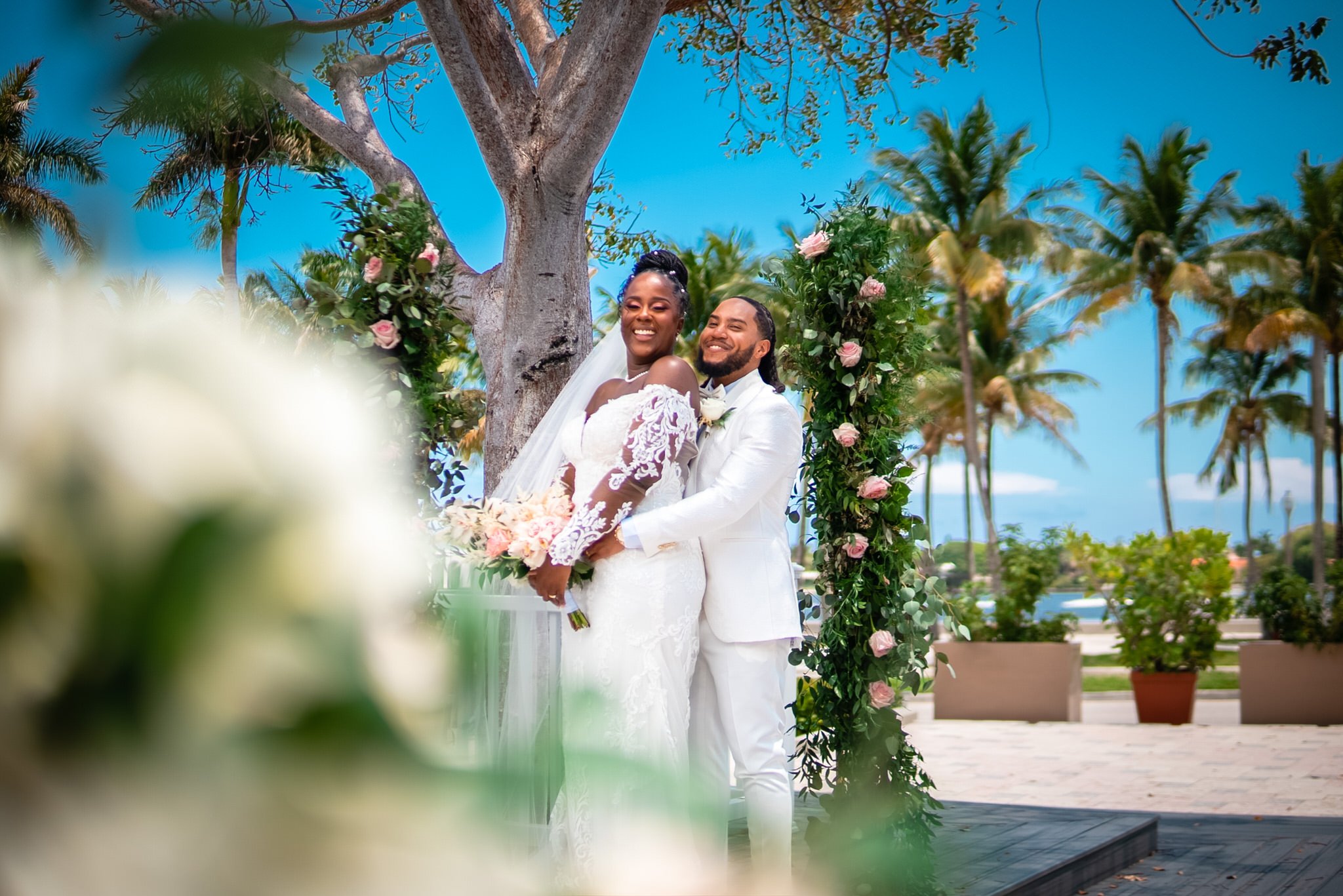 west-palm-beach-lake-pavilion-wedding-venue-couple-holding.jpg