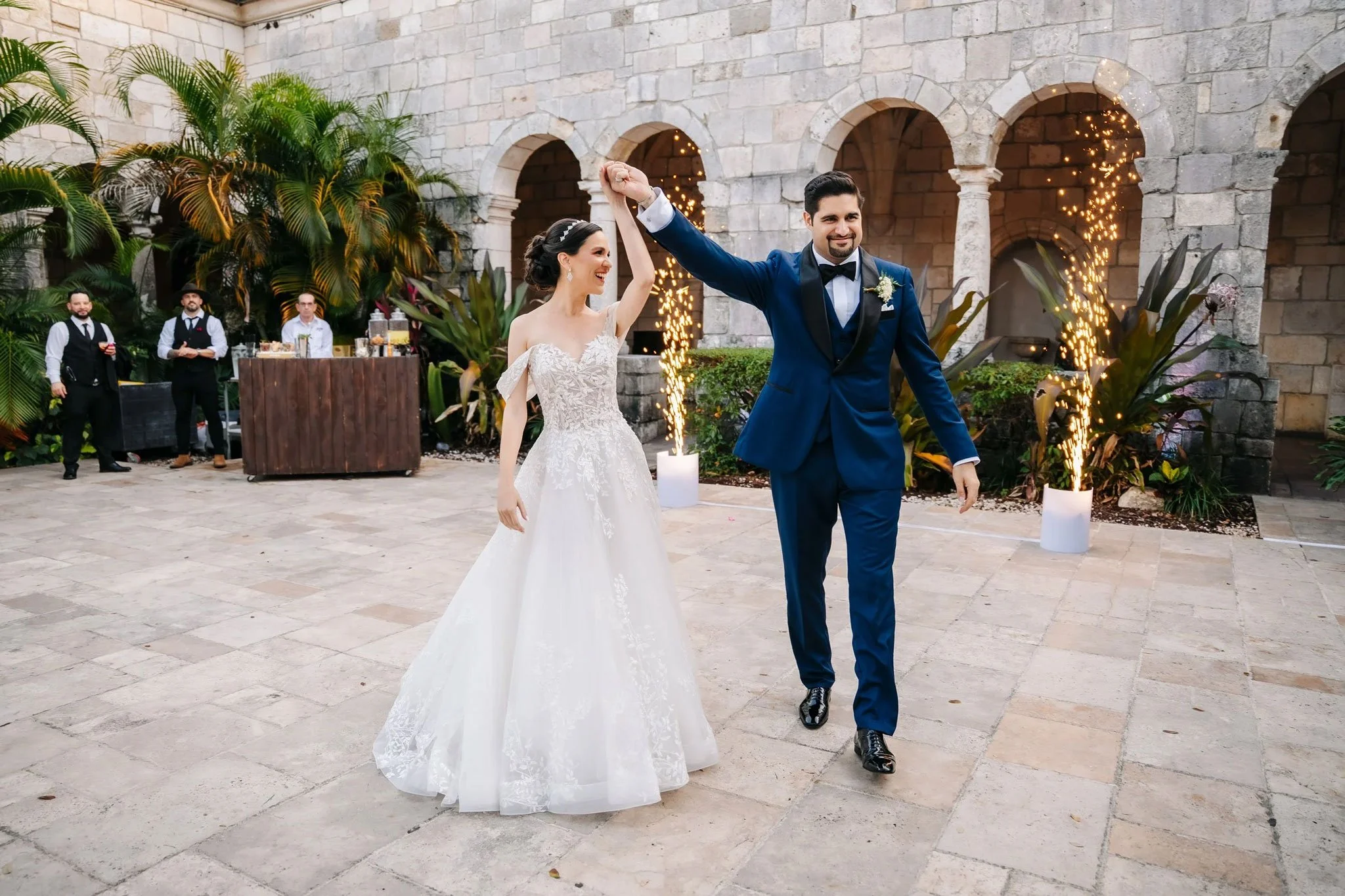 Bride and groom celebrating at the Ancient Spanish Monastery in Miami