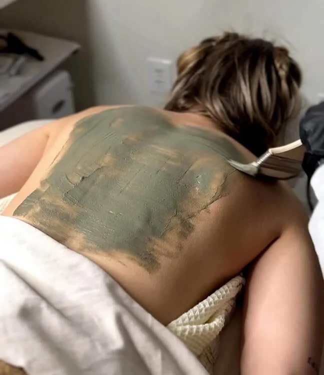 Person getting back facial at Salt + Light Salon and Spa in Cincinnati, Ohio