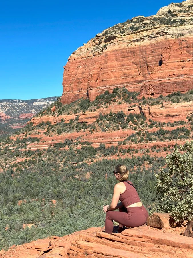 Womens wellness retreat Arizona hike woman looking out