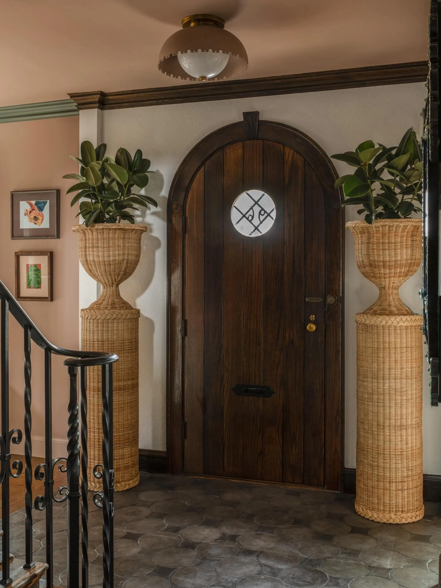 Welcome! Does your entrance say it? 

Some ingredients an entry should have:

-durable flooring, especially here in New England where those boots and snow gear pile up
-a mirror for guests to check themselves before the join you
-a spot to hang your 