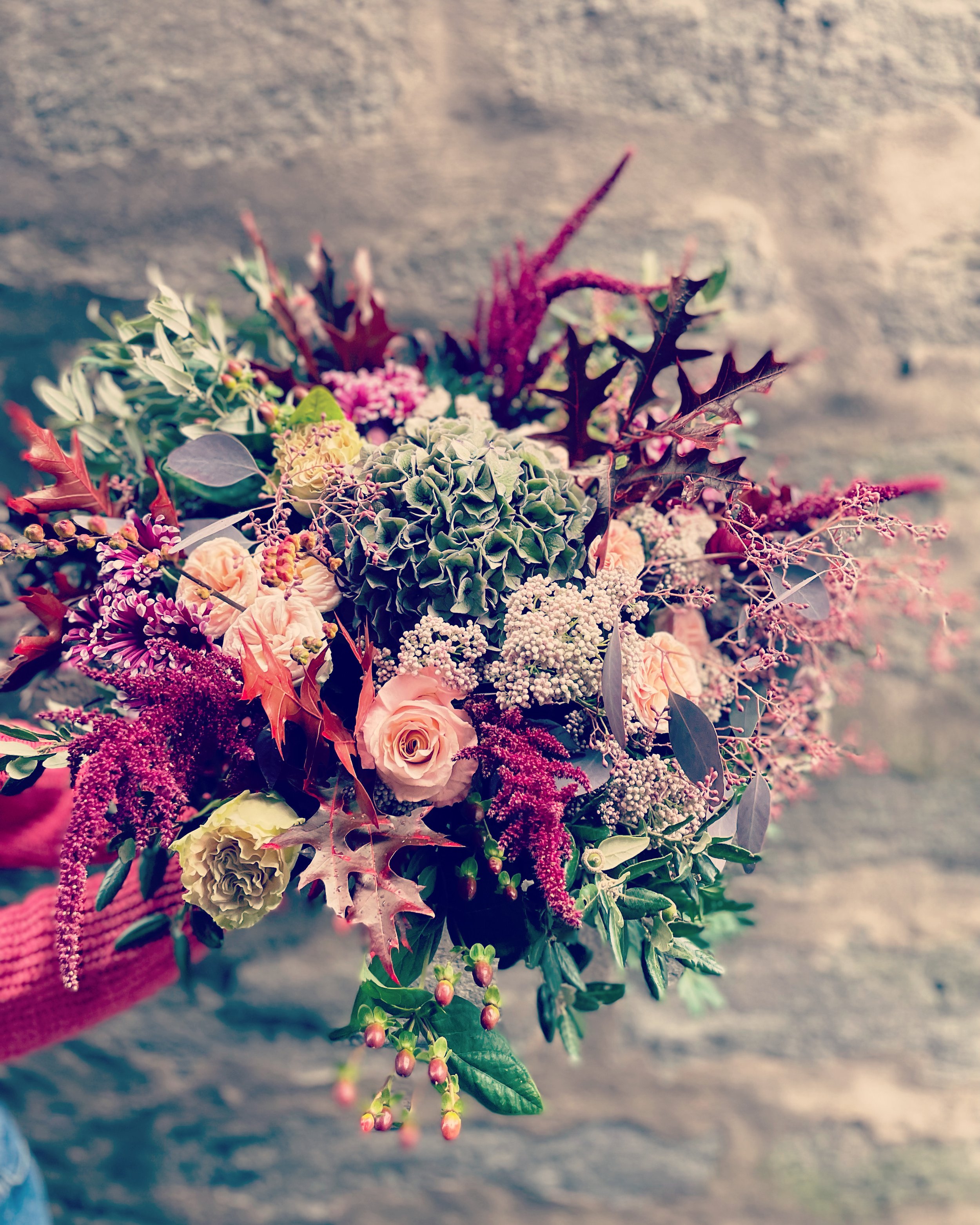 Peaches and plums hand tied bouquet