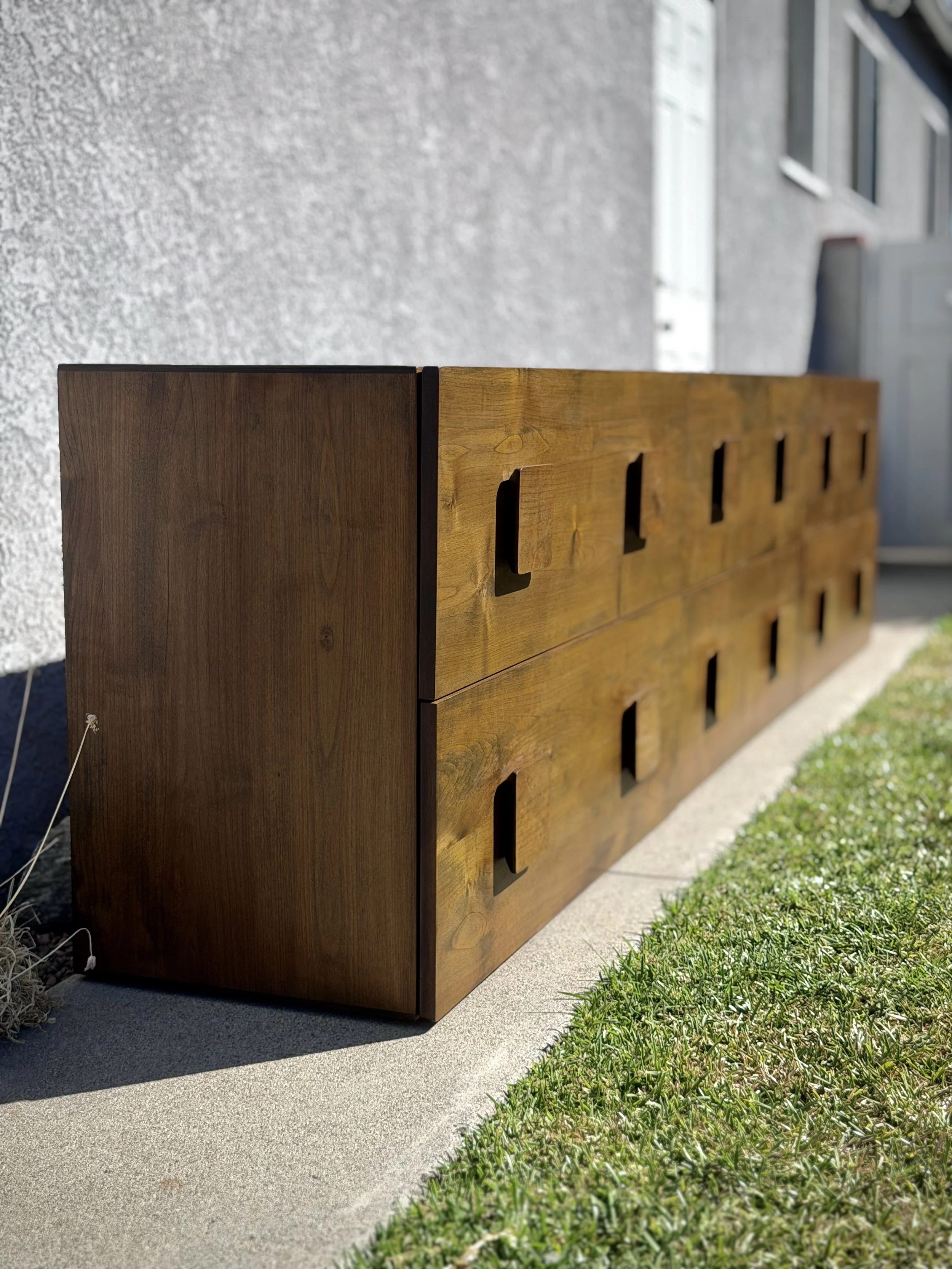 Custom 3-piece mid-century modern modular TV stand in the iconic "Carmen" style. Handbuilt from solid Alder and Poplar, finished with General Finishes Provincial and Amber dye. Versatile modular blocks can be arranged as a long media console, nightst