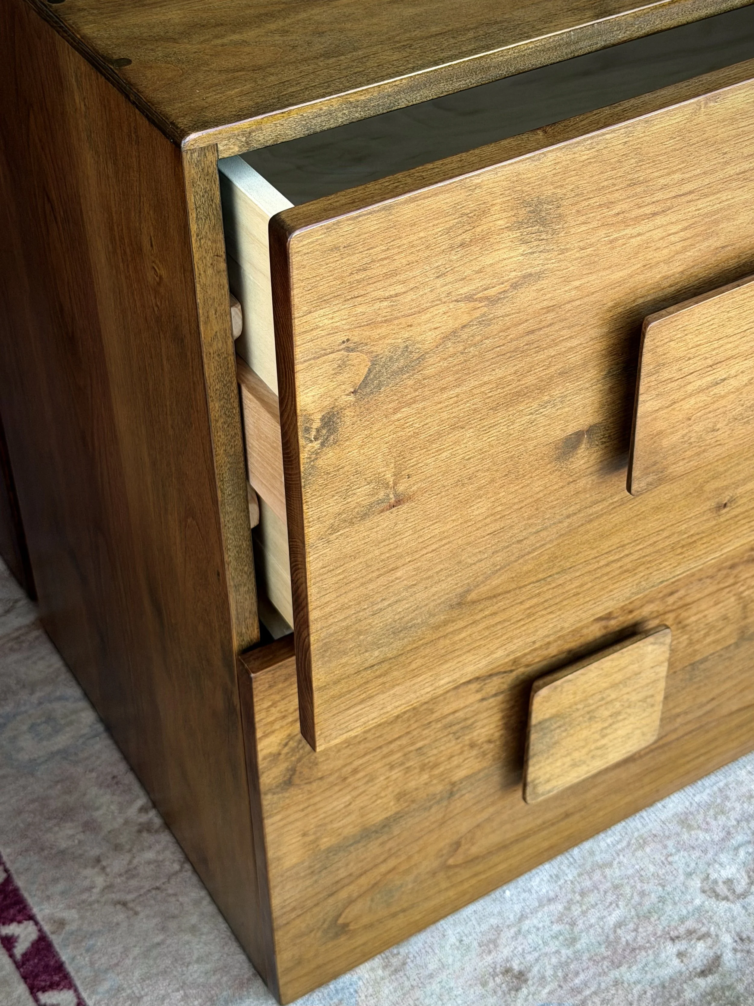 Custom 3-piece mid-century modern modular TV stand in the iconic "Carmen" style. Handbuilt from solid Alder and Poplar, finished with General Finishes Provincial and Amber dye. Versatile modular blocks can be arranged as a long media console, nightst