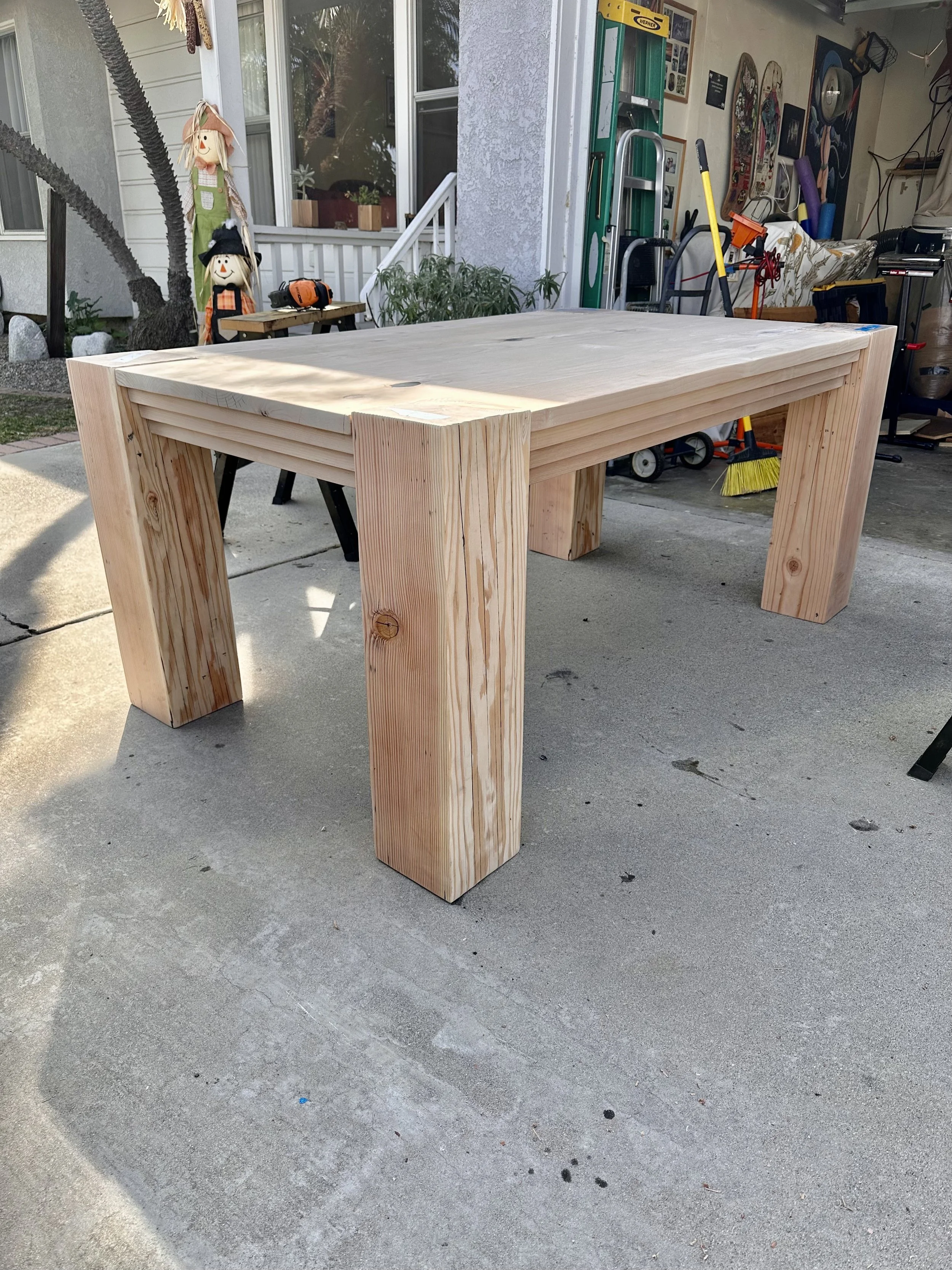 The second Loeffler Table has a story behind it. The client had a beloved dining table that was built from construction lumber and held together more by hope than craftsmanship. She hired me to rebuild it the right way. The massive 7.5 inch square Do
