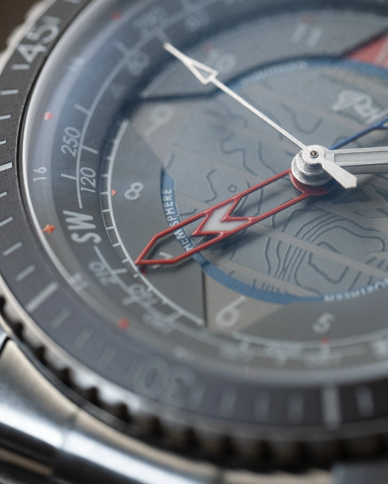 Details matter.

The dial of the Lark is complex, yet relentlessly clean. We engineered the subtle topographic contour lines to add incredible depth, catching the light without ever compromising the mission at hand.

In land navigation, clarity is ev