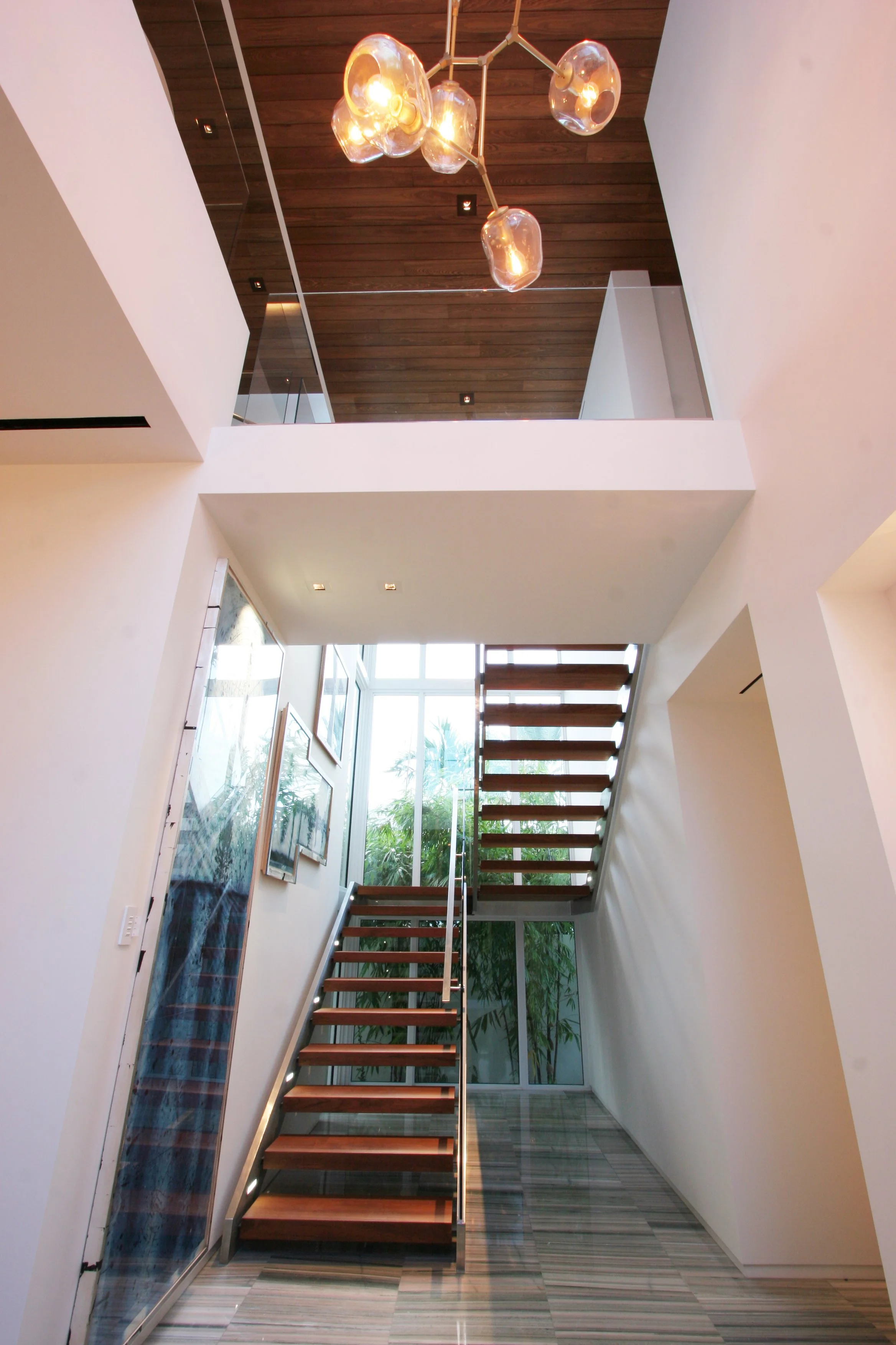 Custom floating teak stairs