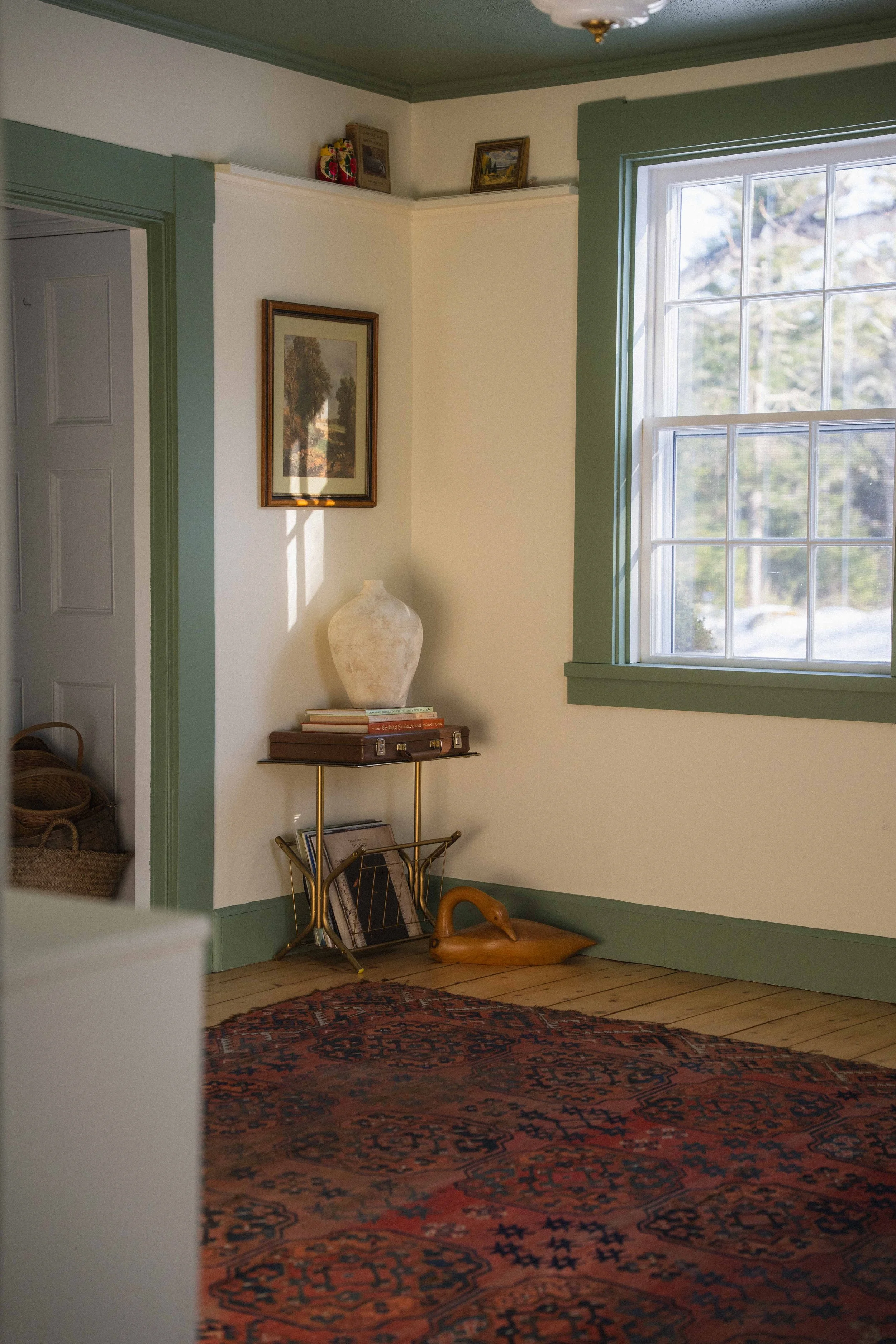 whimsical cottage interiors, collected and curated antiques, modern folk aesthetic home design, colonial home living room