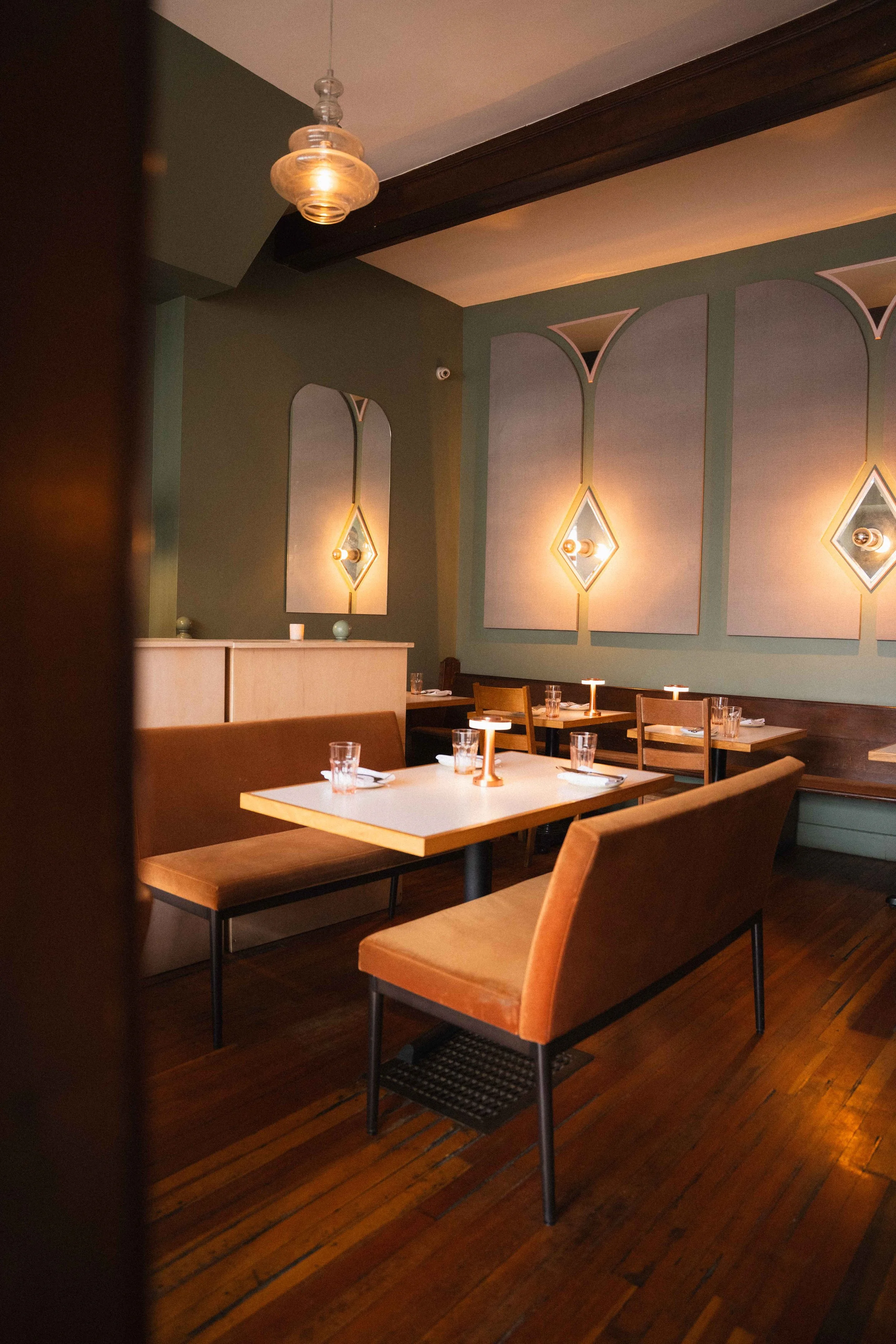 the interior of a restaurant in Halifax, Nova Scotia. The Ostrich Club cocktail bar with art deco design in the North End in a guide to restaurants in the city