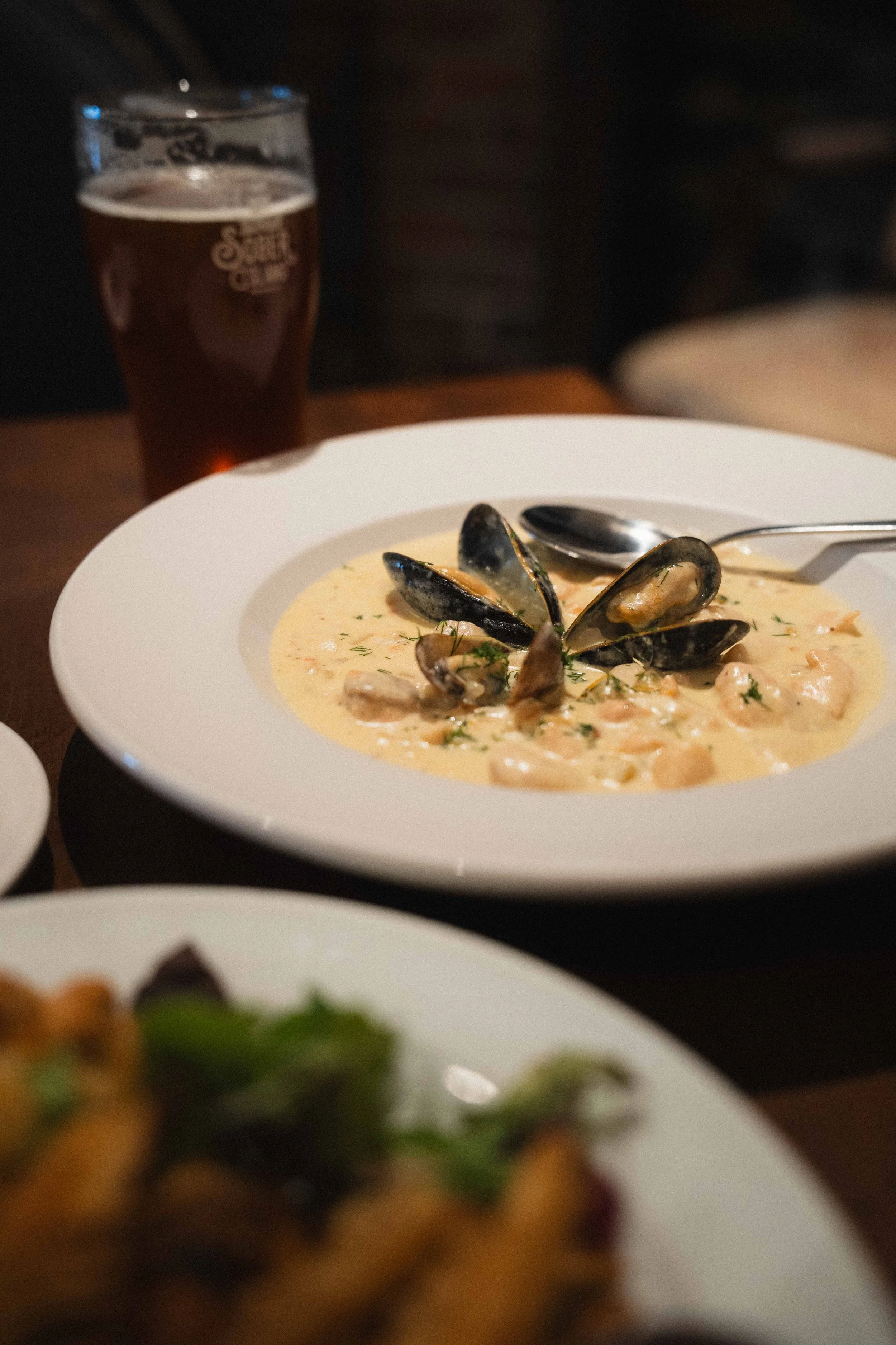 a plate of seafood chowder in Atlantic Canada pub